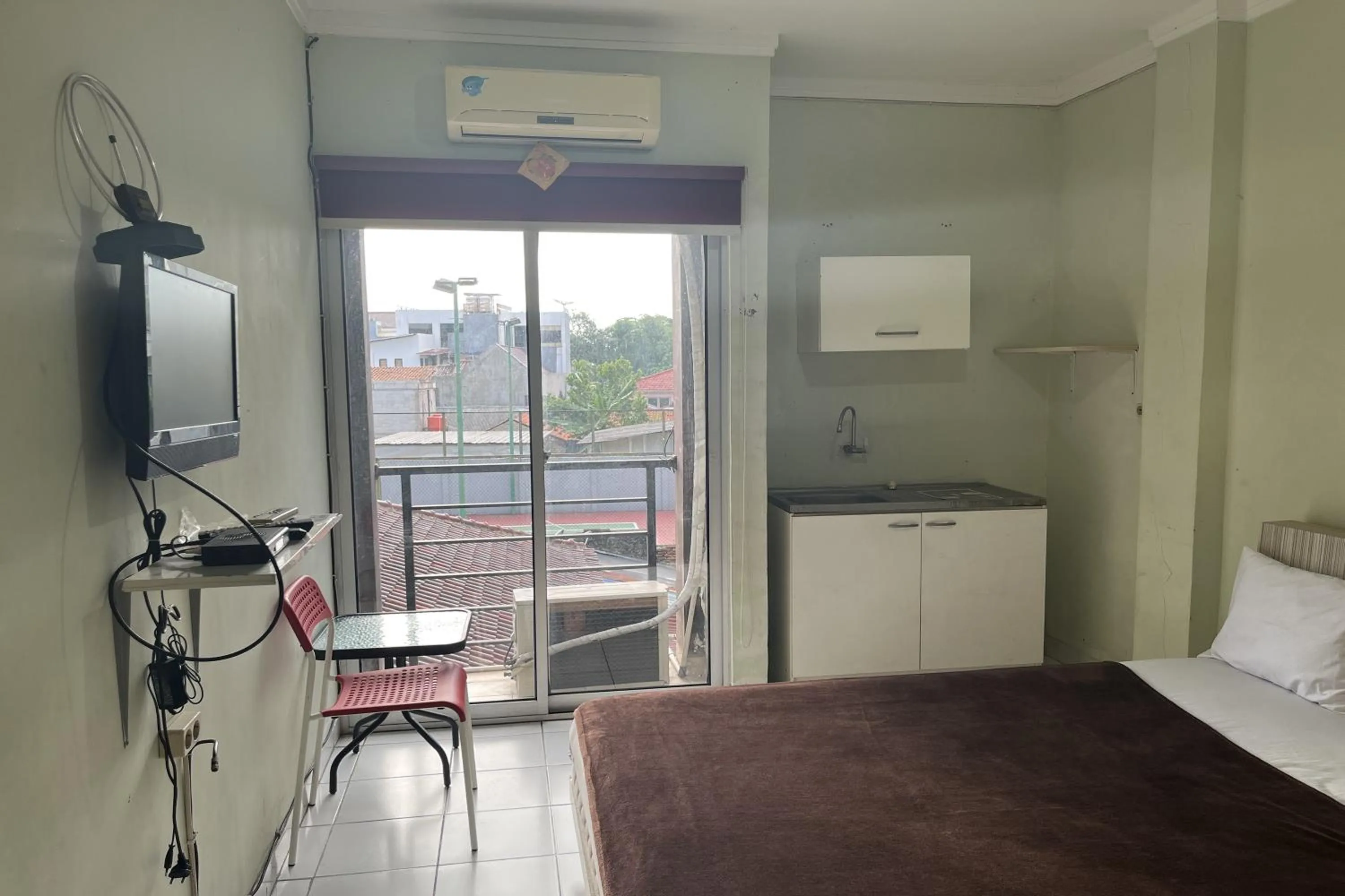 Photo of the whole room, Bed in Sultan Residence Syariah