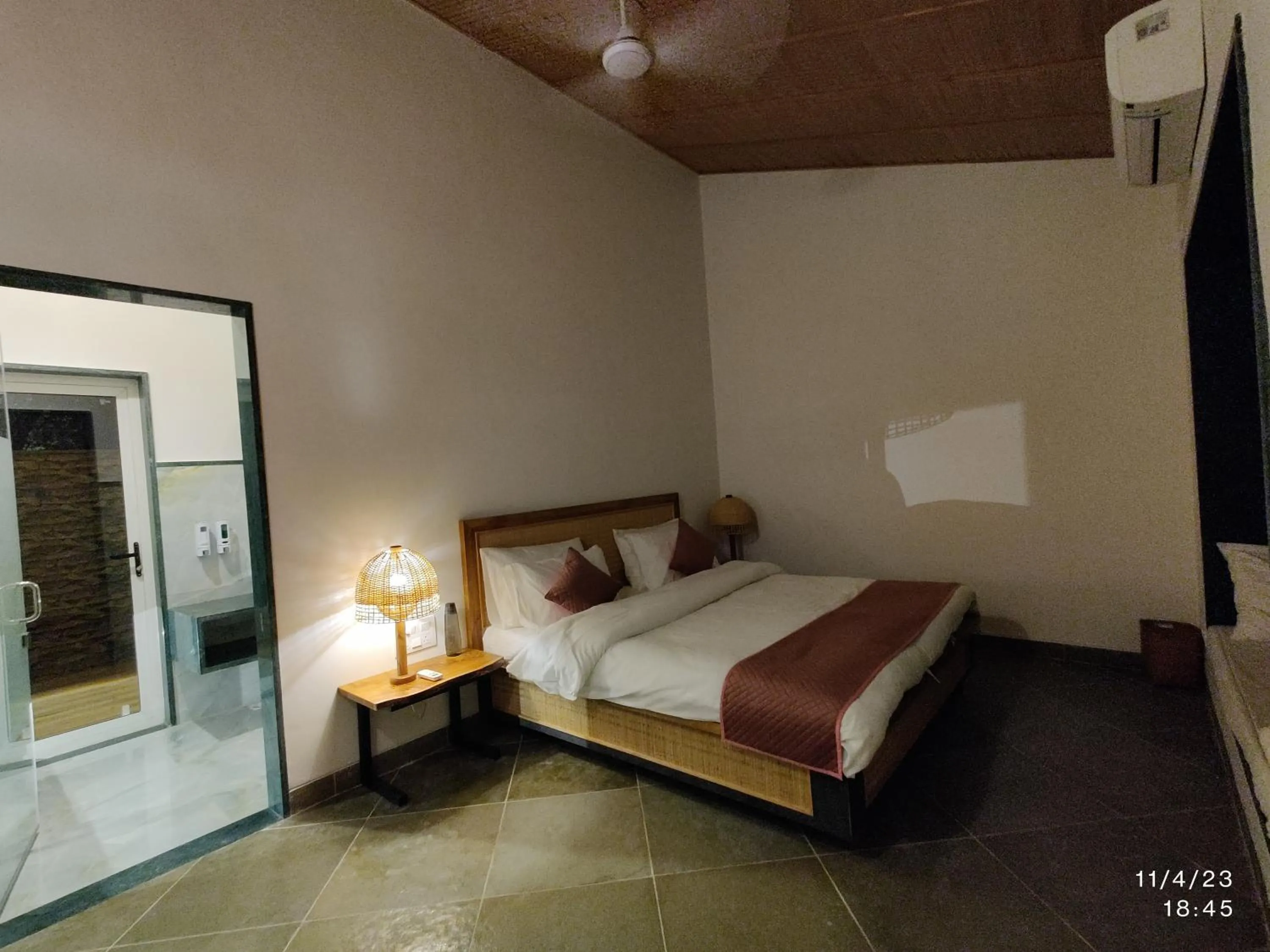 Bed in GiriSadan Organic Retreat & Experiences