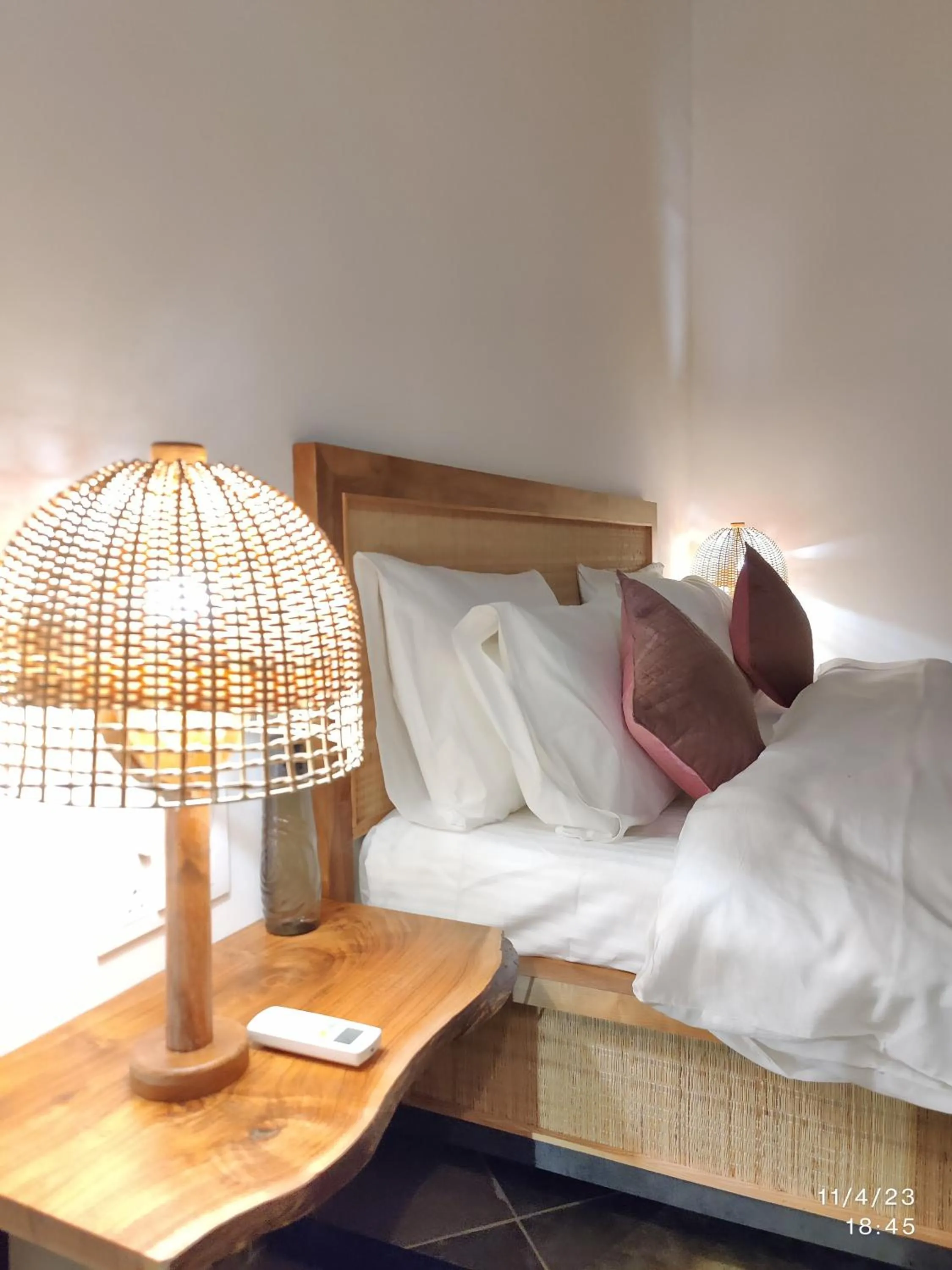 Bed in GiriSadan Organic Retreat & Experiences