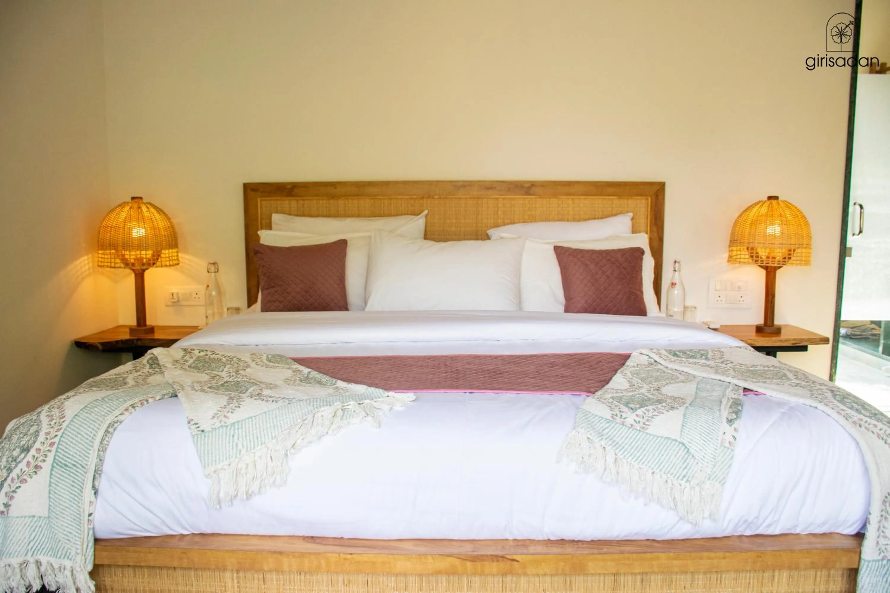 Bed in GiriSadan Organic Retreat & Experiences