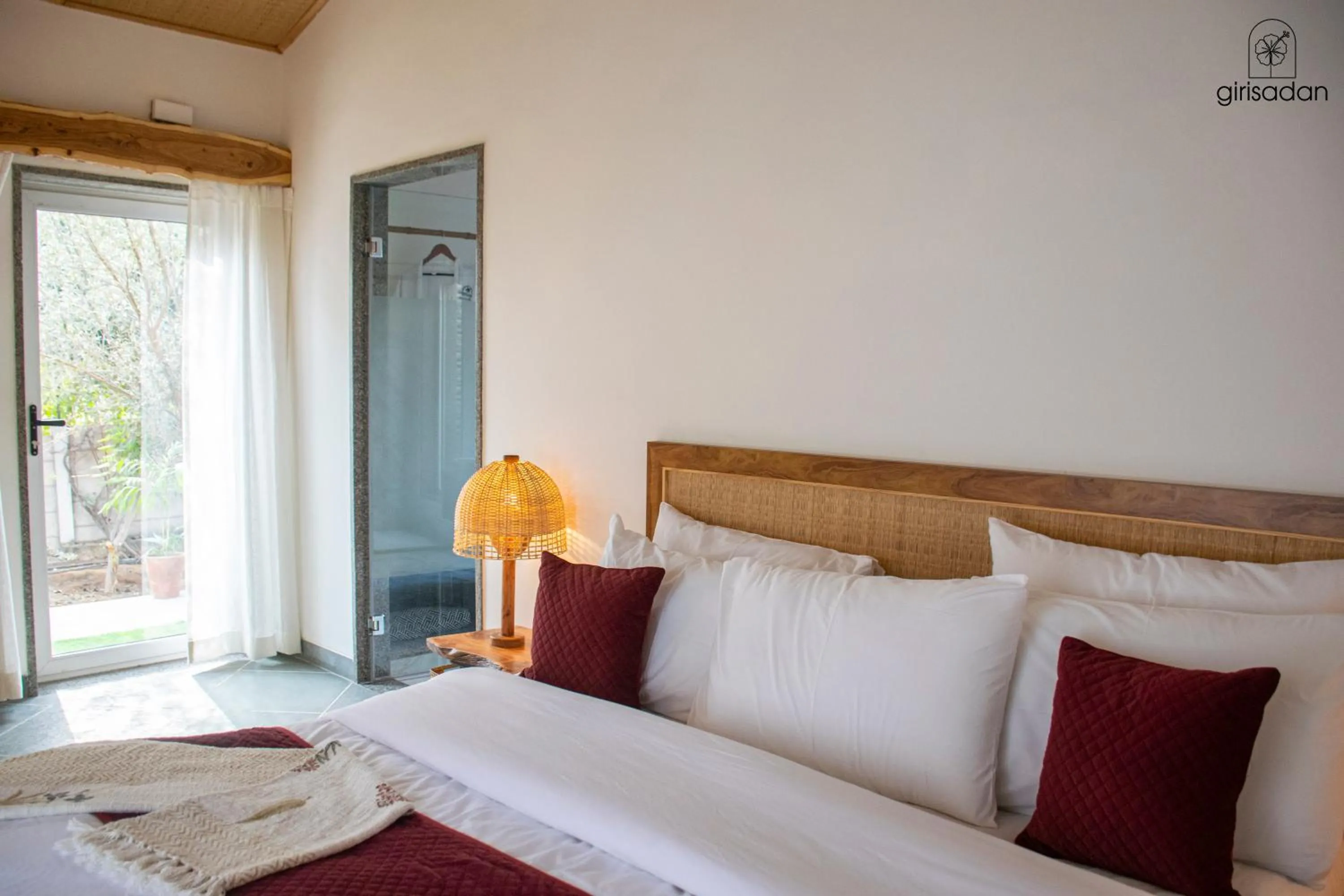 Bed in GiriSadan Organic Retreat & Experiences