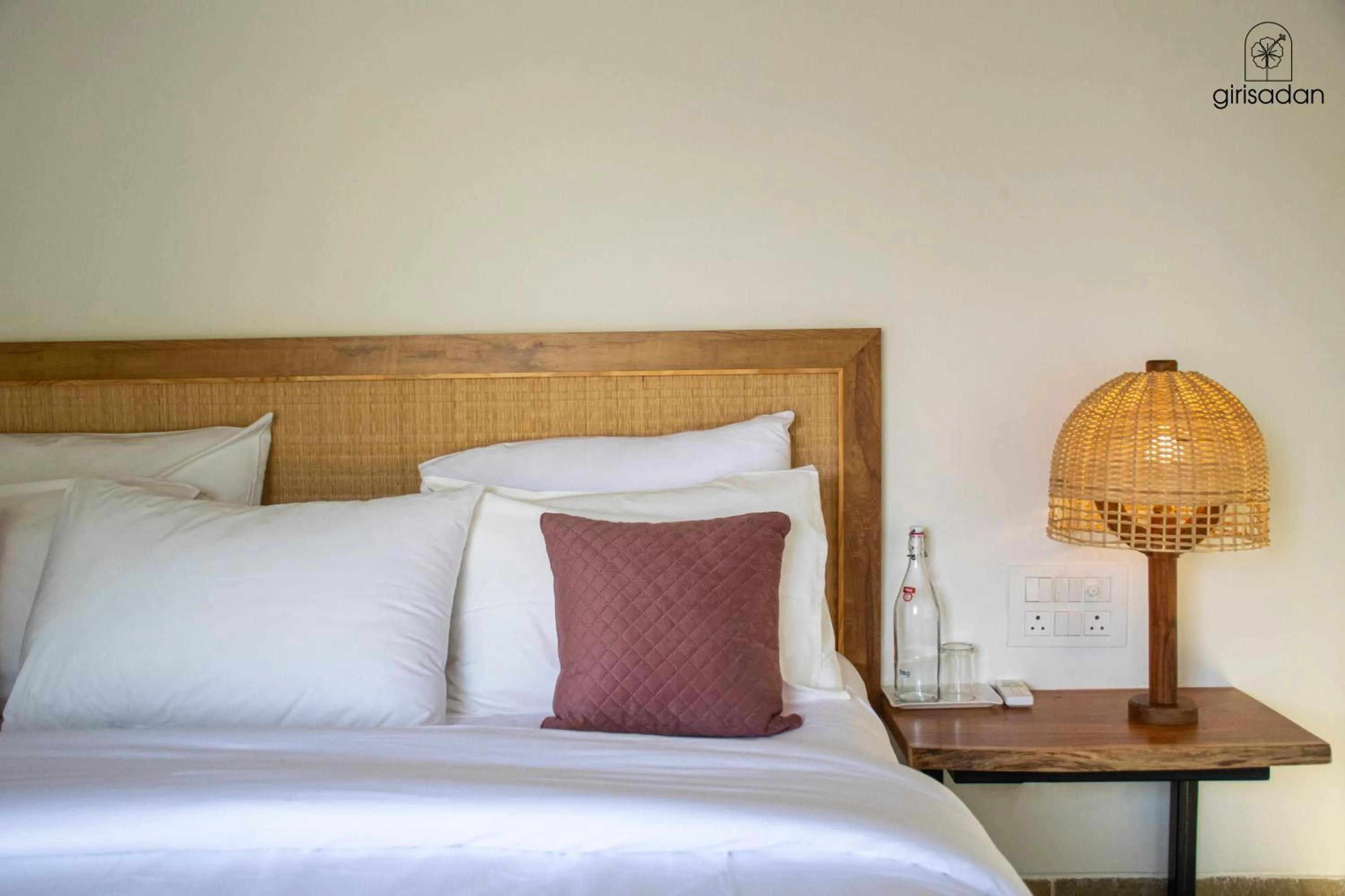 Bed in GiriSadan Organic Retreat & Experiences