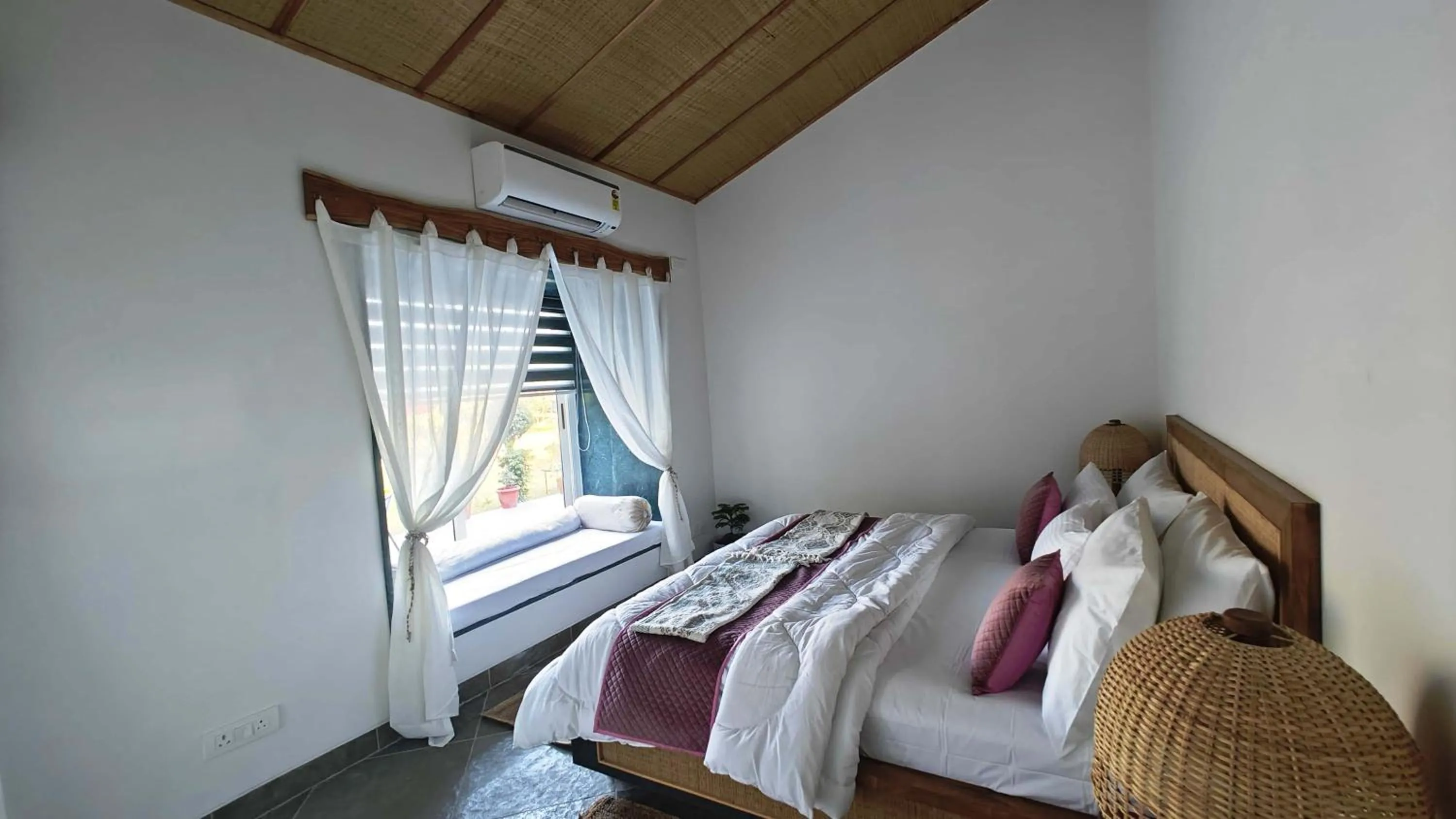 Bed in GiriSadan Organic Retreat & Experiences