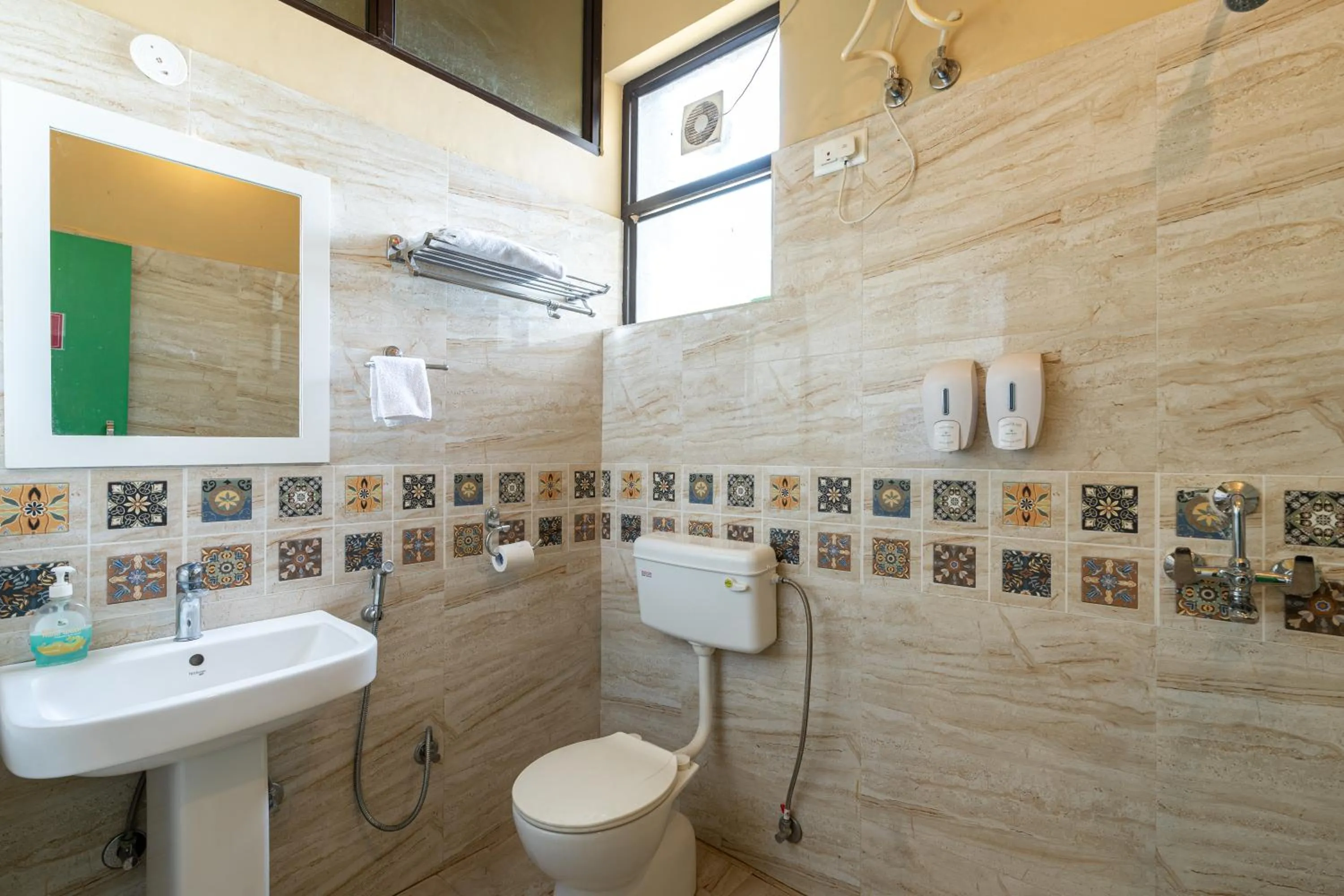 Shower in GiriSadan Organic Retreat & Experiences