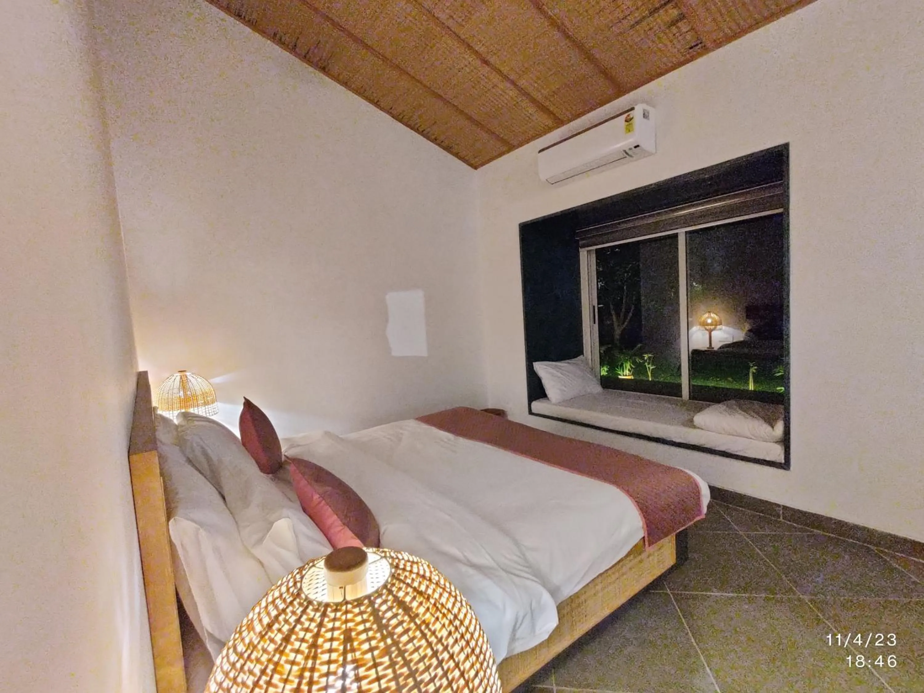 Bed in GiriSadan Organic Retreat & Experiences