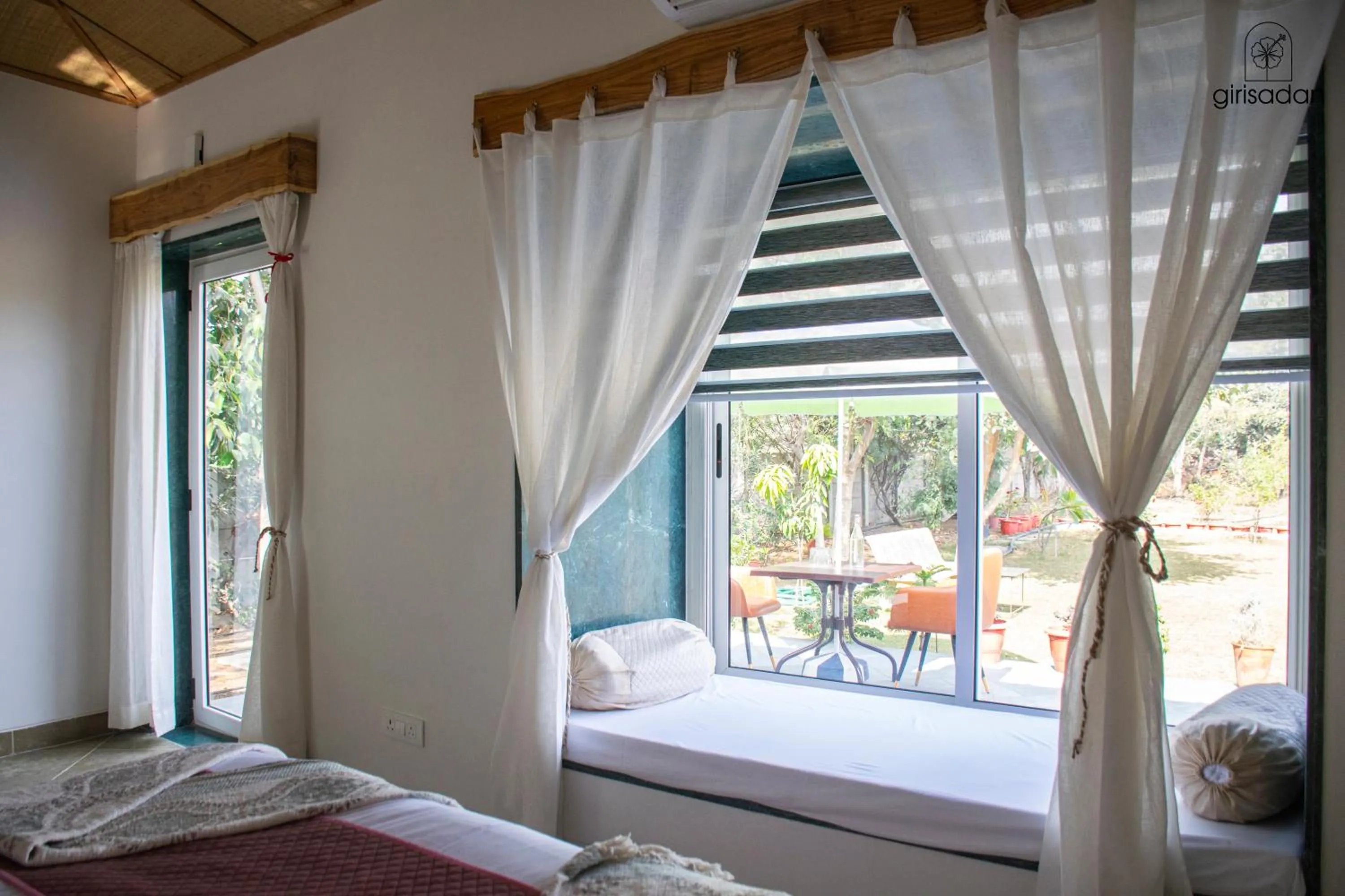 Bed in GiriSadan Organic Retreat & Experiences