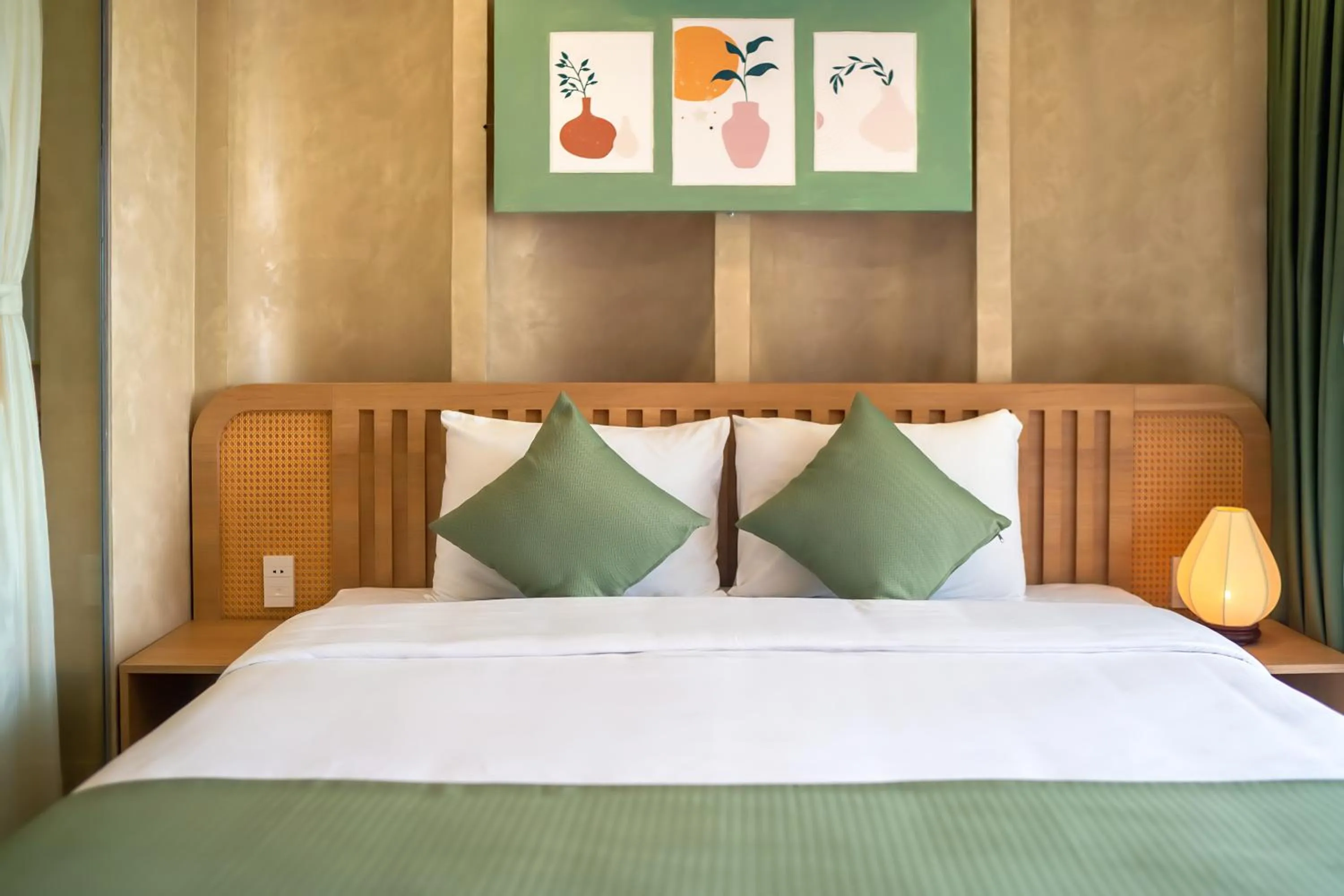 Bed in The Linh Seaside Villa Hoi An