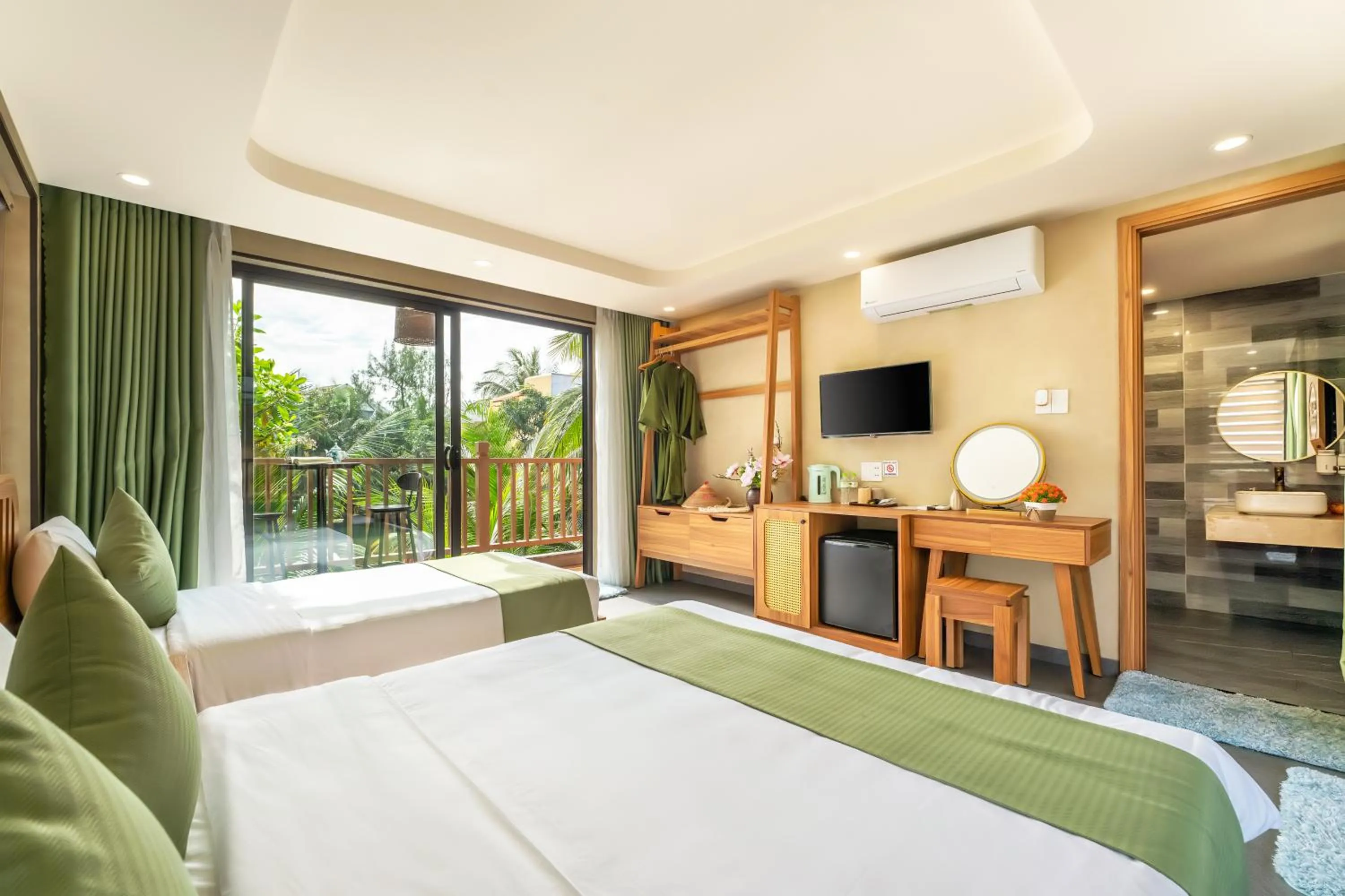 Bed in The Linh Seaside Villa Hoi An