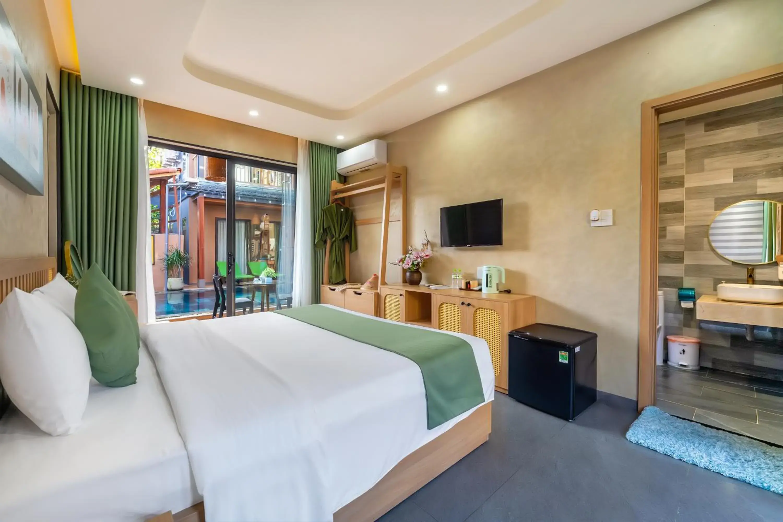 Pool view, Bed in The Linh Seaside Villa Hoi An Pool view, Bed in The Linh Seaside Villa Hoi An