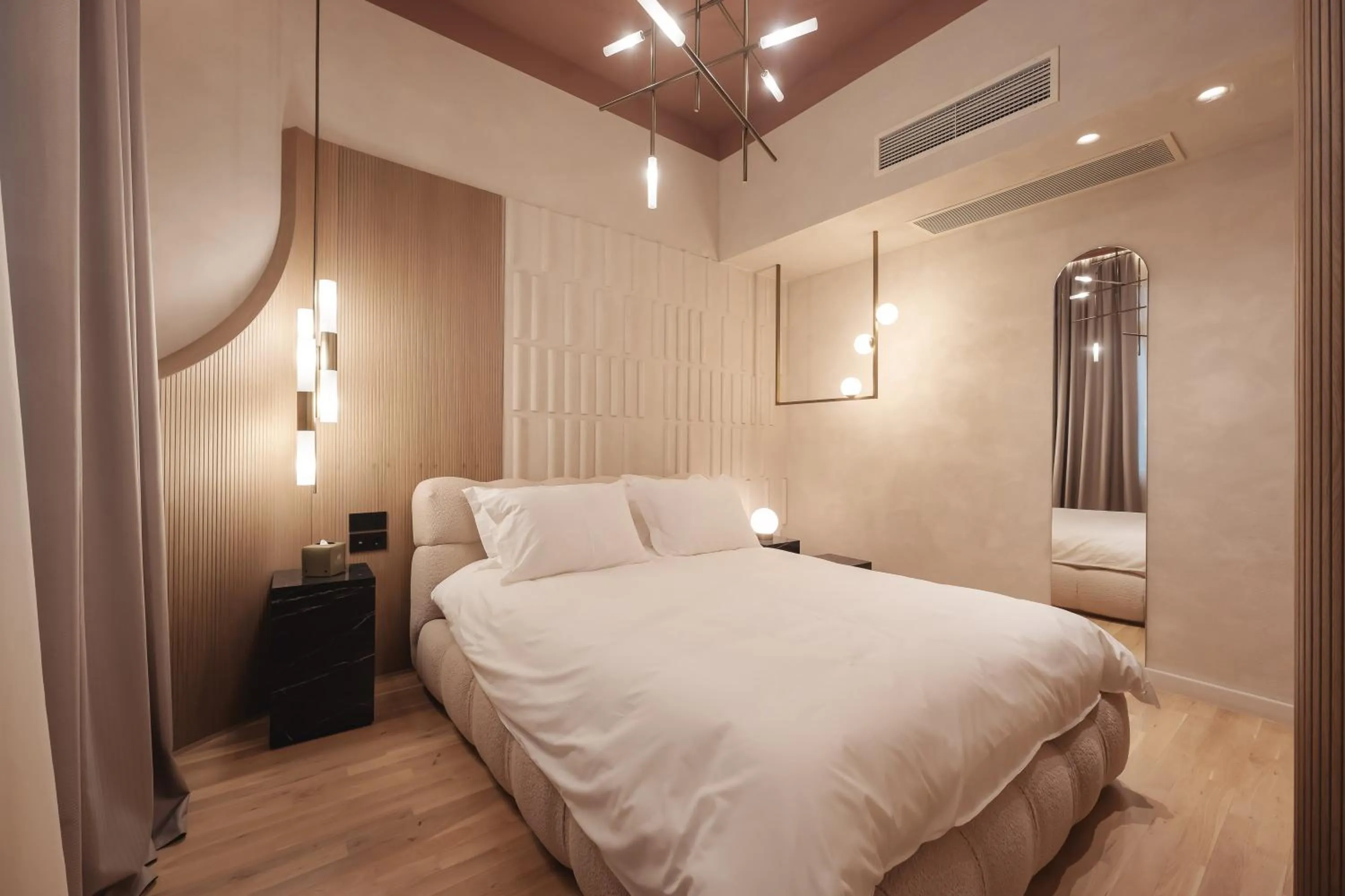 Bed in Zenith Premium Suites