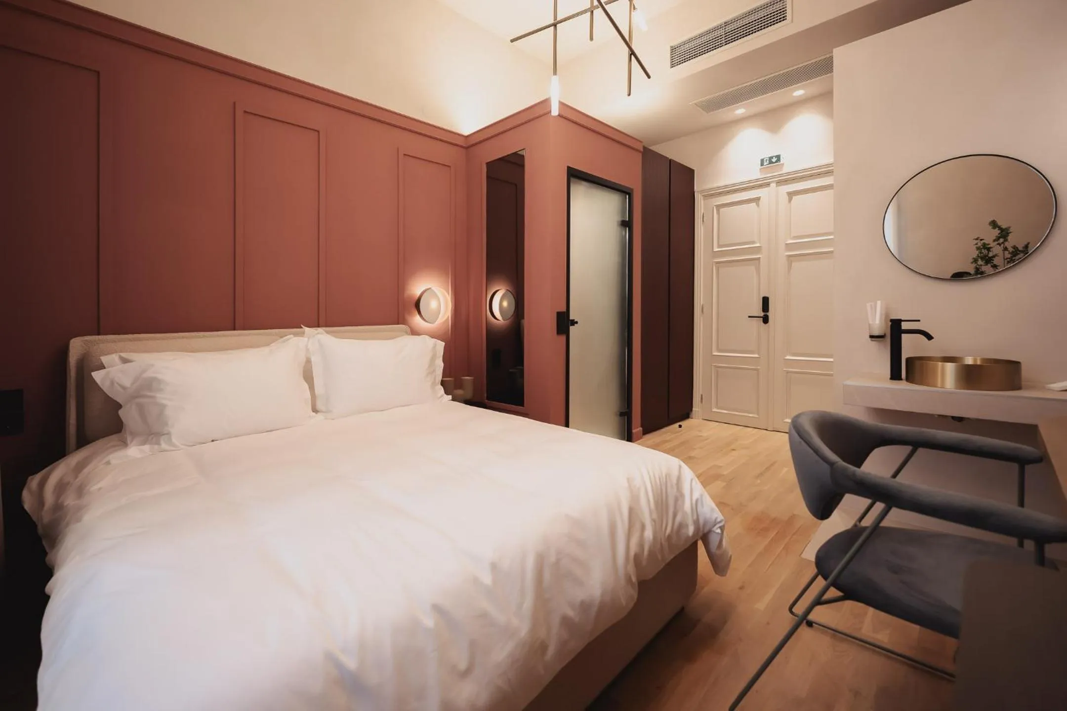 Bed in Zenith Premium Suites