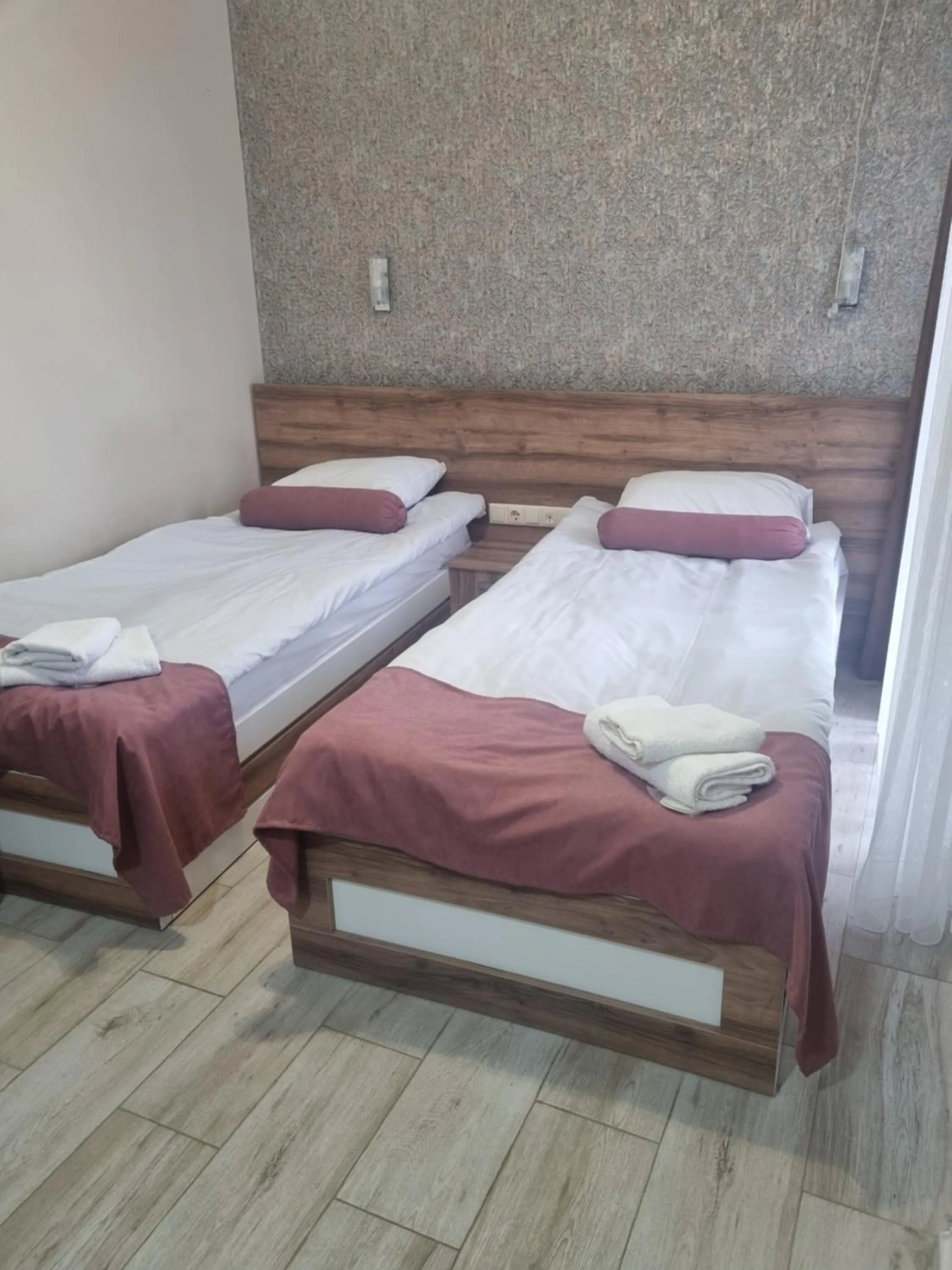 Bed in MAHALI HOTEL