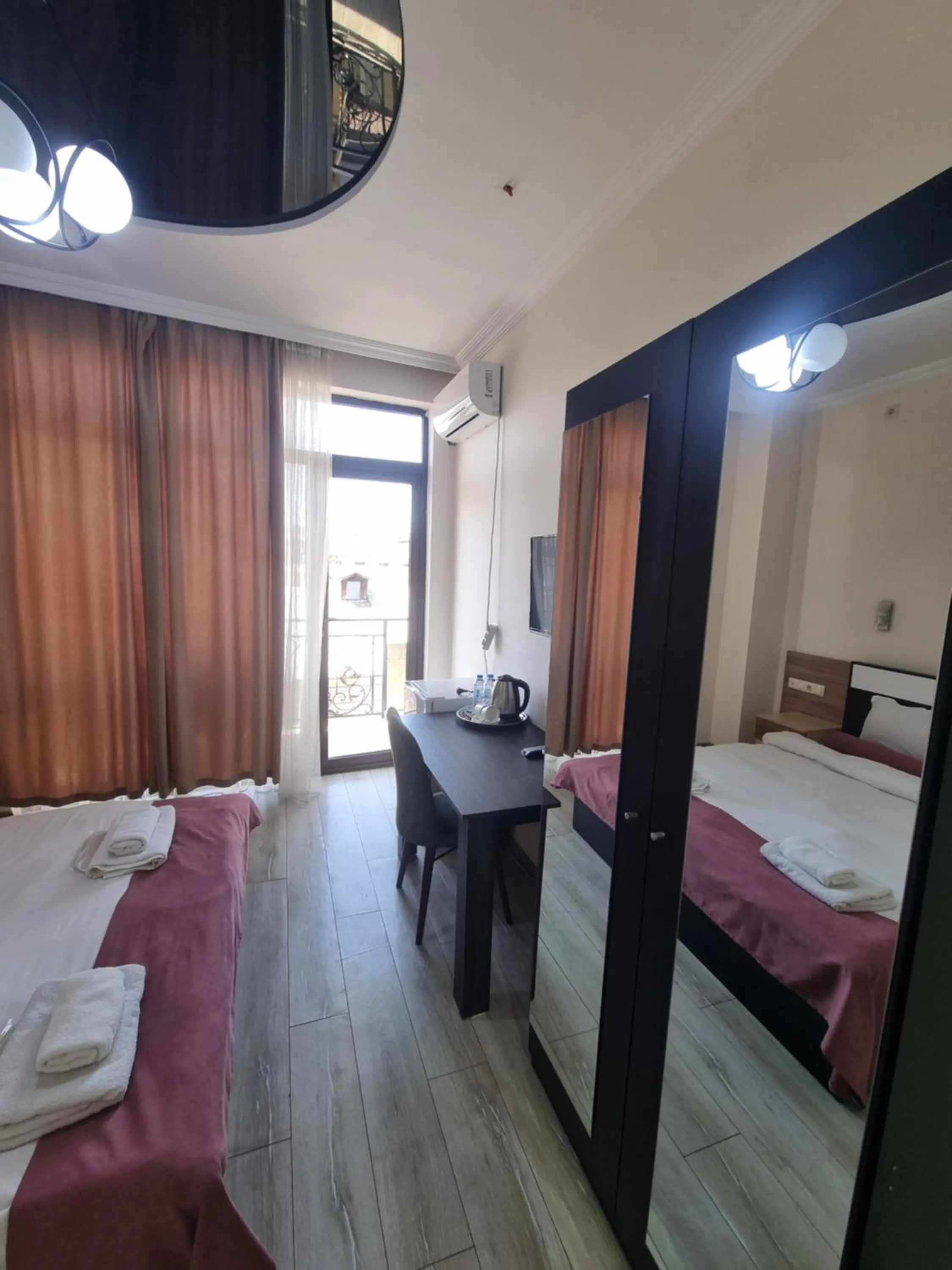 View (from property/room), Bed in MAHALI HOTEL