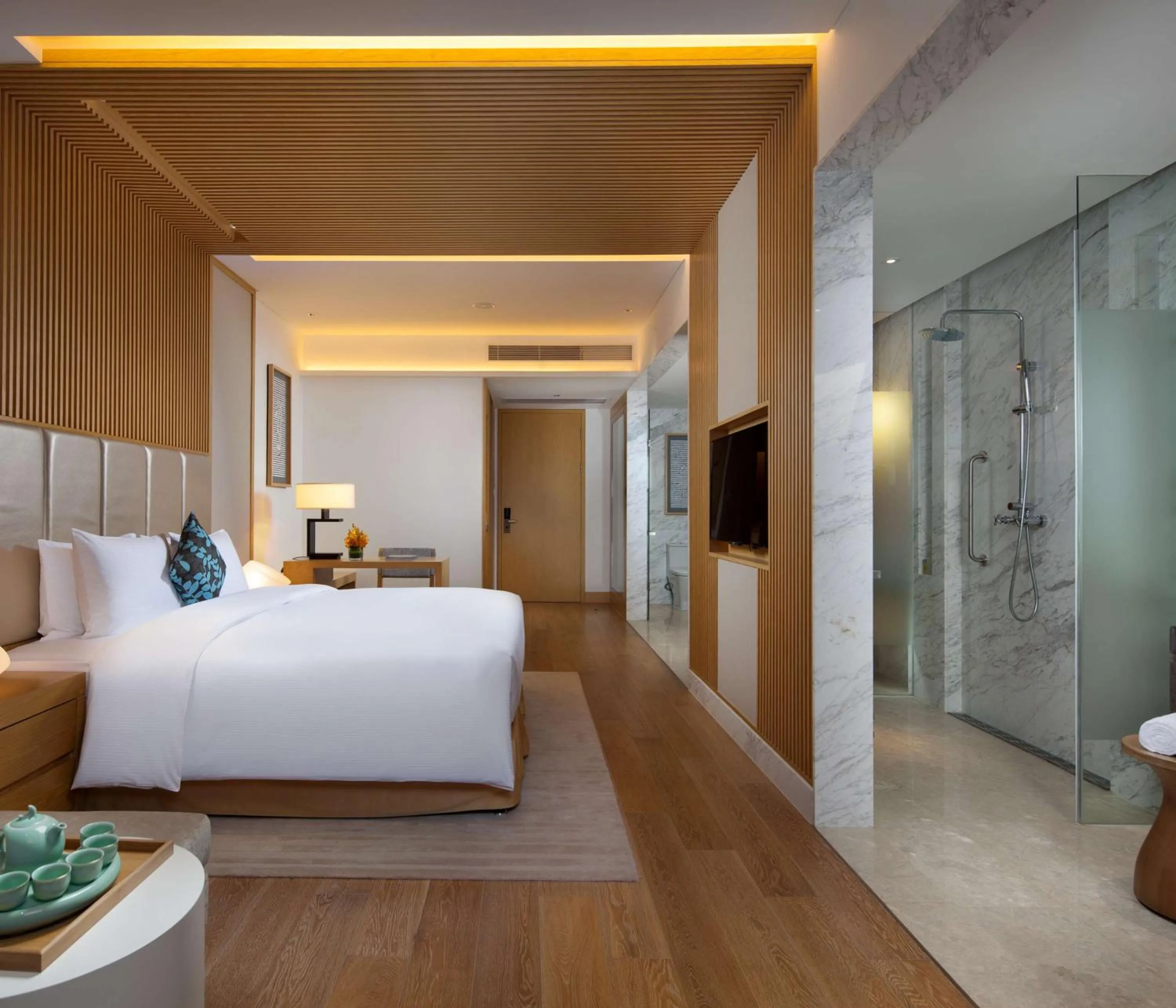 Bathroom, Bed in Sanya Yazhou Bay Resort Curio Collection by Hilton