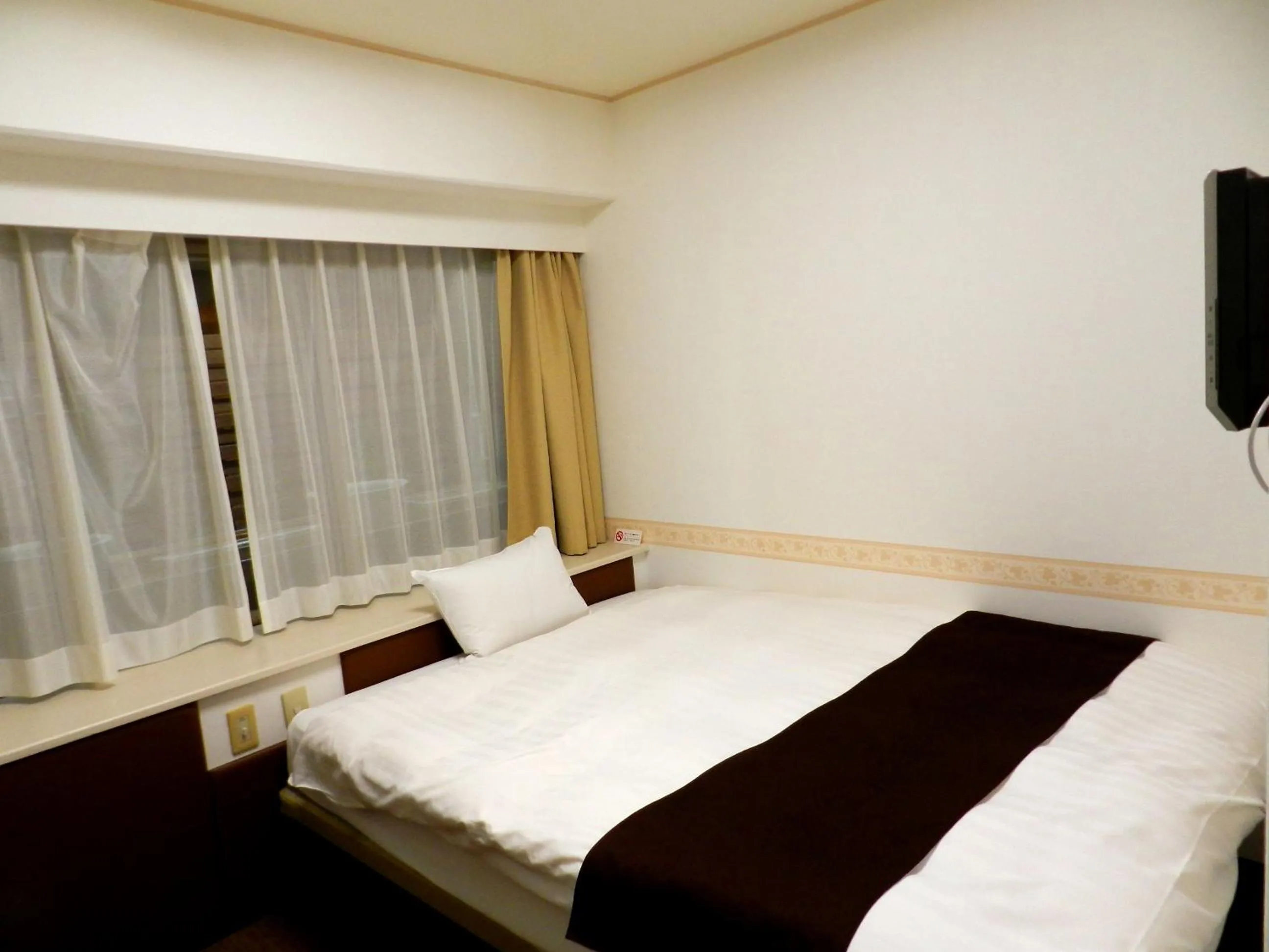 Bed in Check In Matsuyama