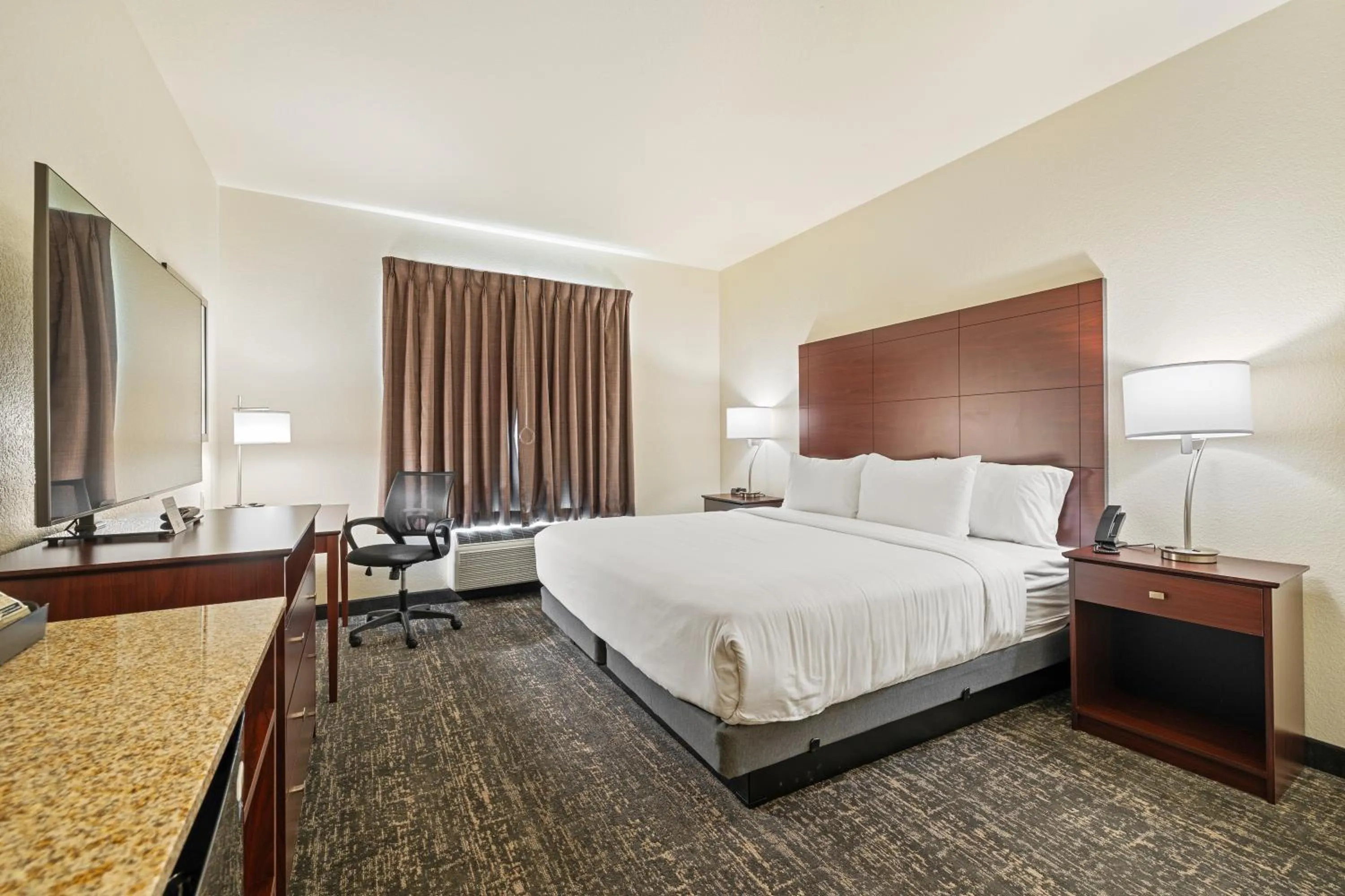 Bed in Cobblestone Hotel & Suites - Alpine