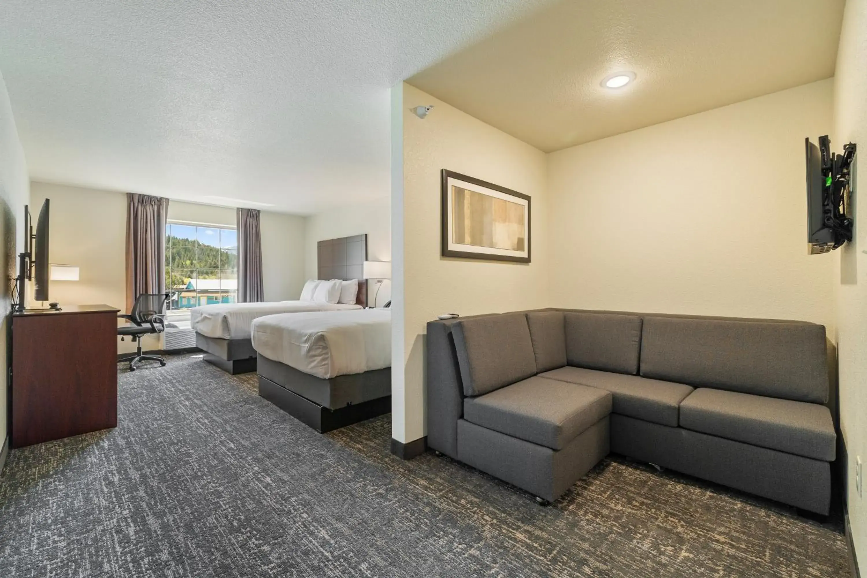 Bed in Cobblestone Hotel & Suites - Alpine Bed in Cobblestone Hotel & Suites - Alpine