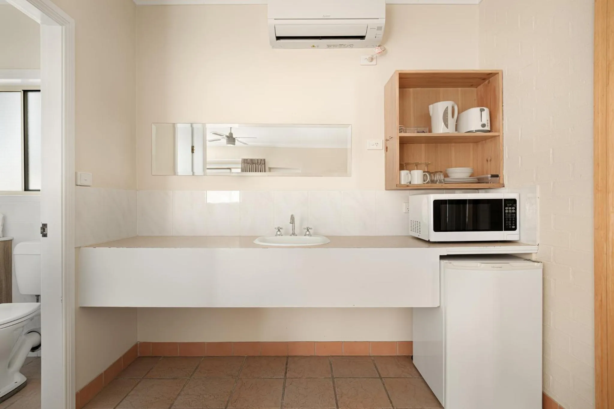 Kitchen or kitchenette in Catalina Motel Lake Macquarie