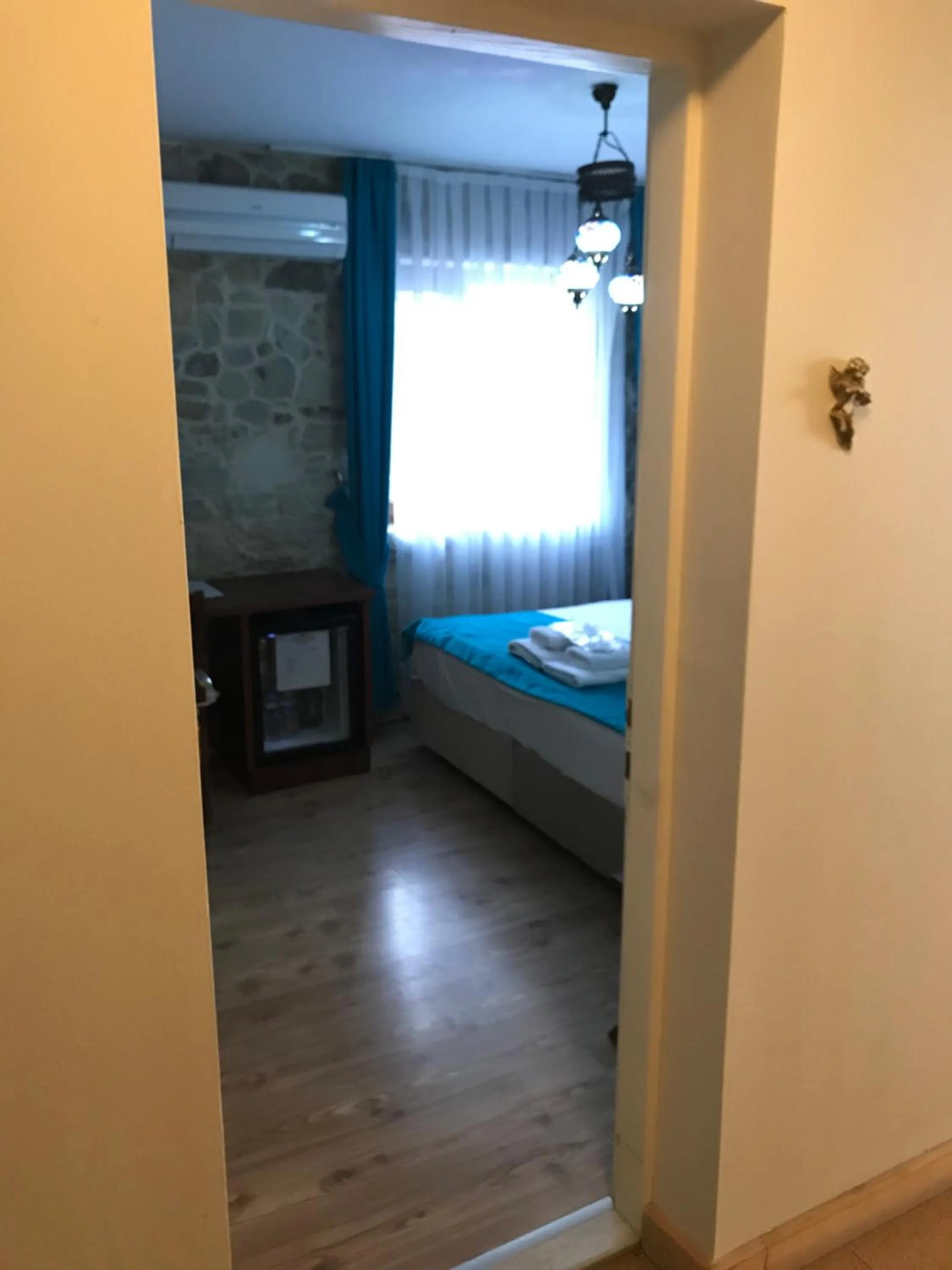 Photo of the whole room, Bed in Foca Antik Otel