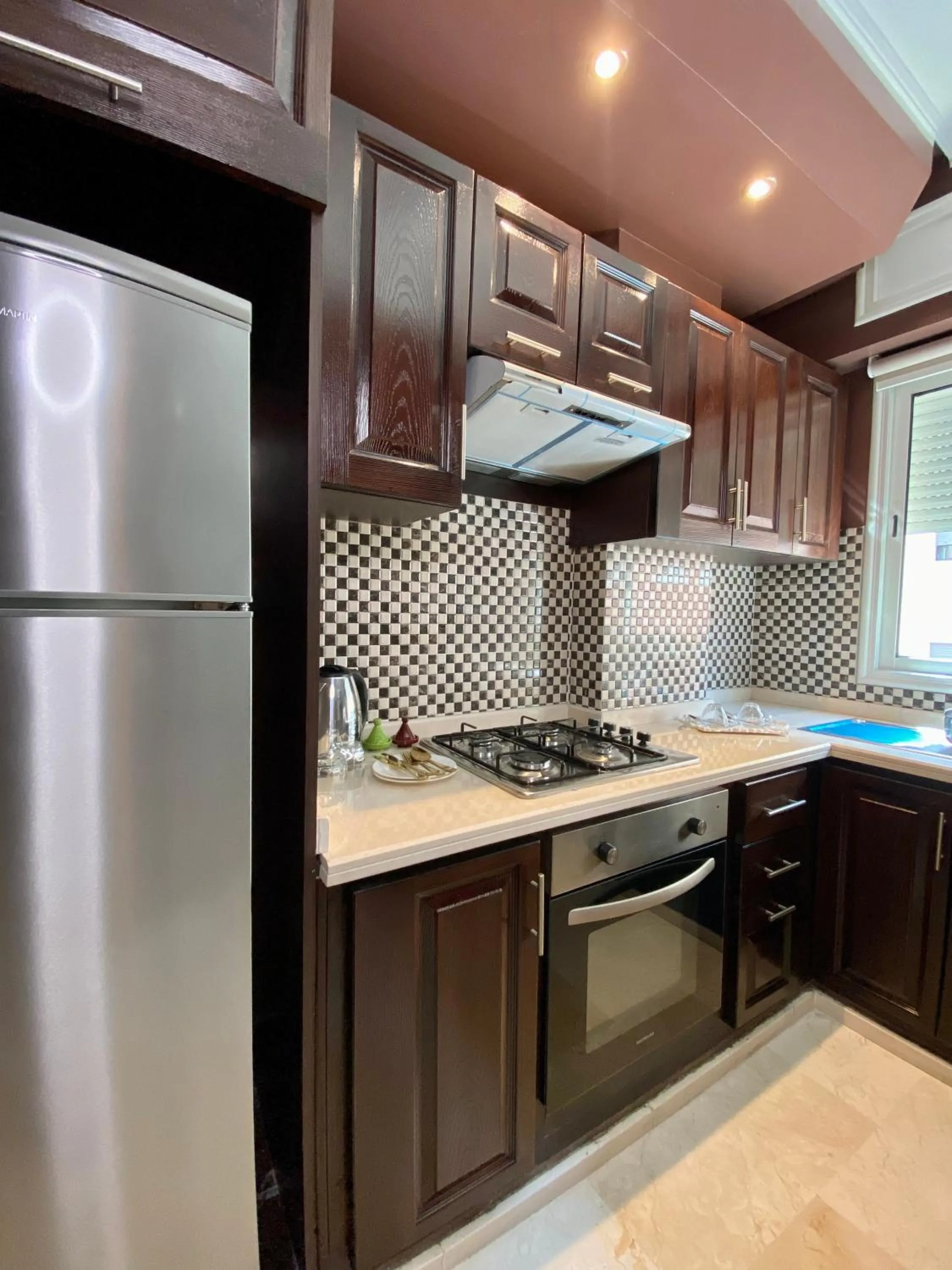 Kitchen or kitchenette in Appart Hôtel Oleandro