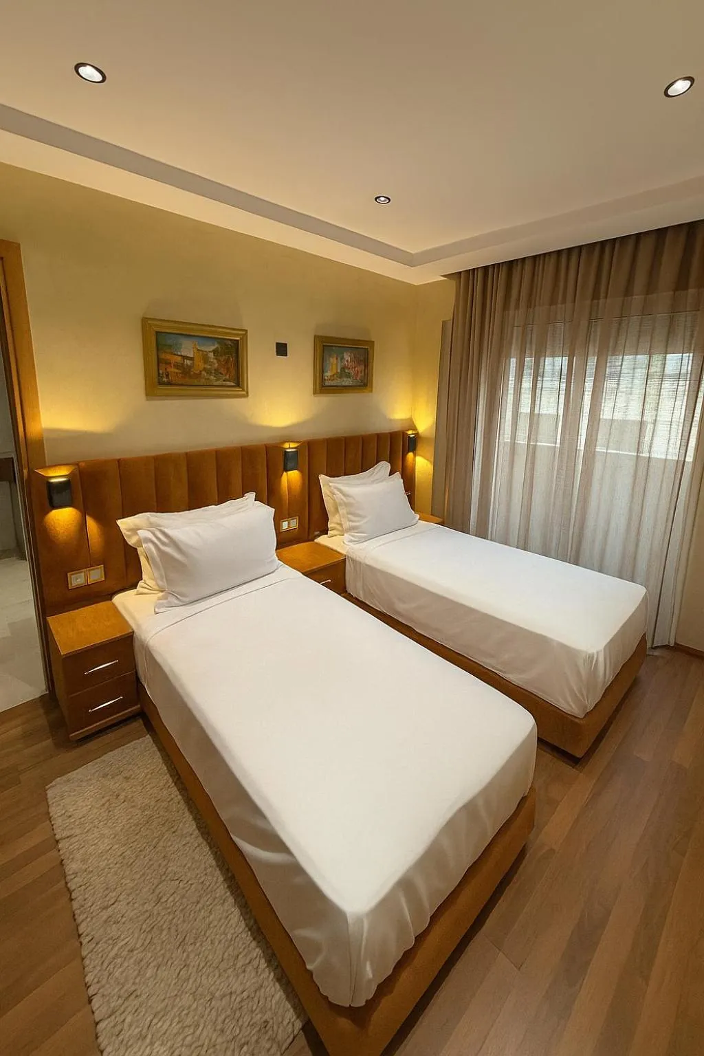 Bed in Appart Hôtel Oleandro