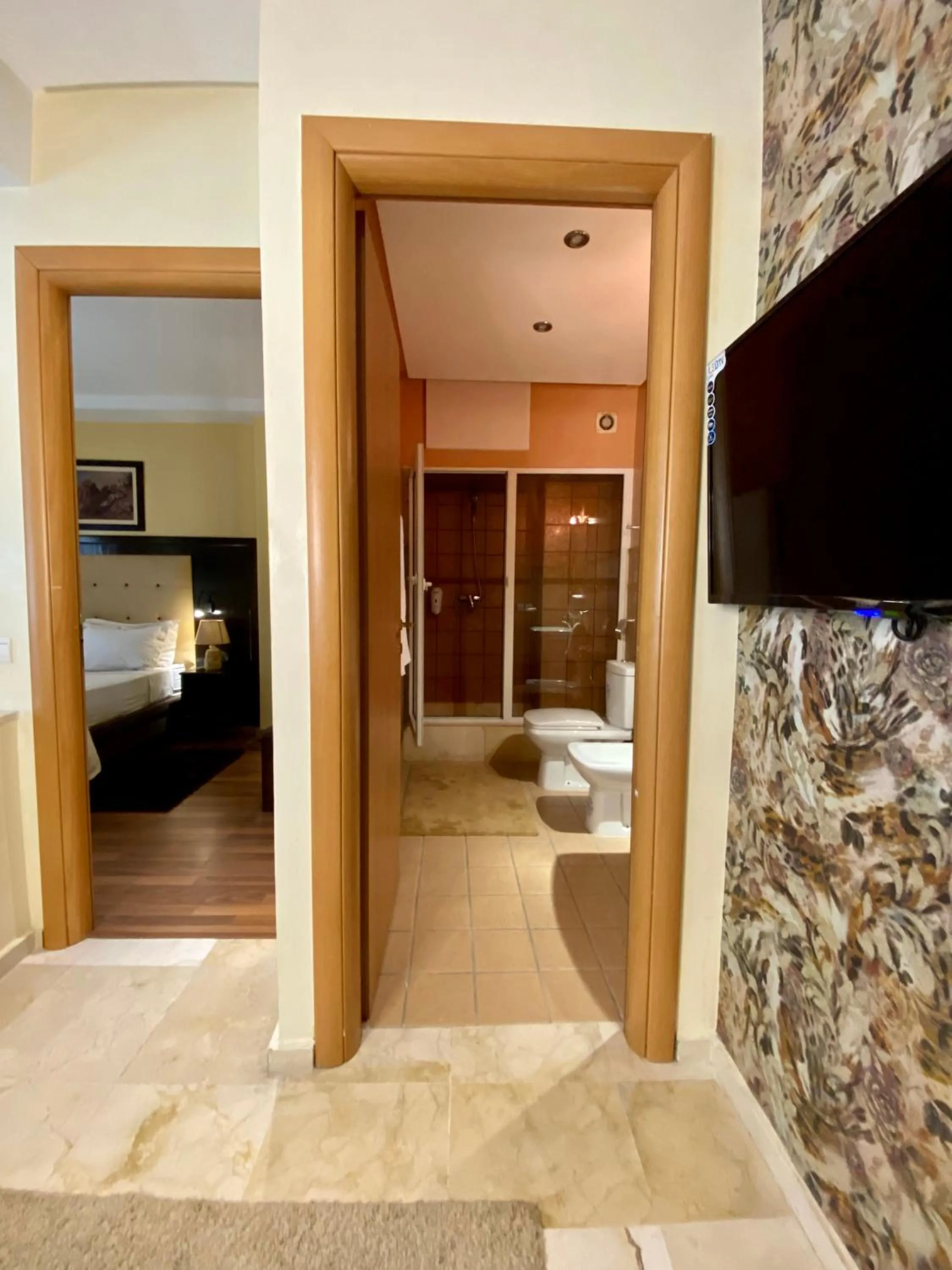 Shower in Appart Hôtel Oleandro