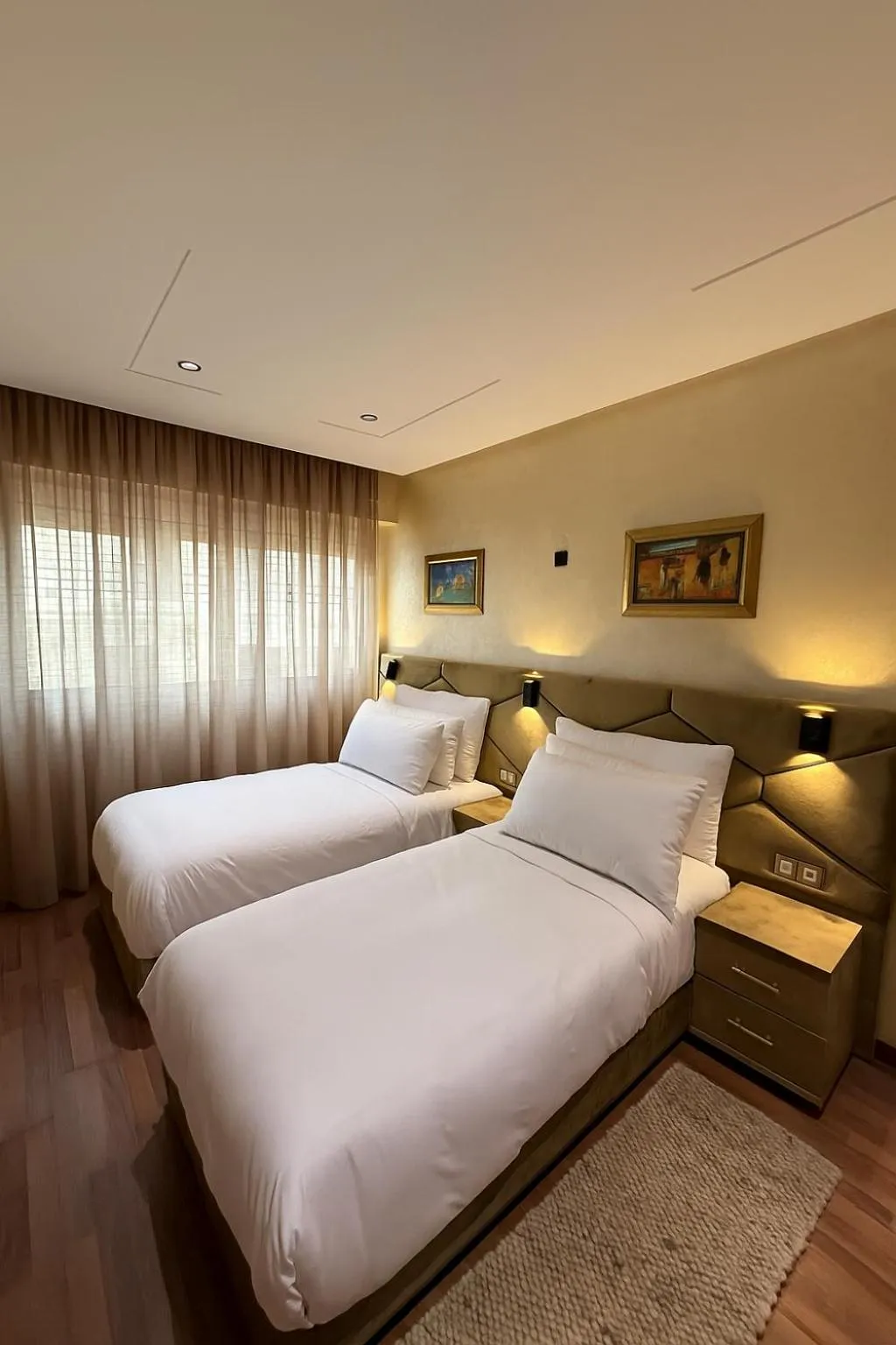 Bed in Appart Hôtel Oleandro