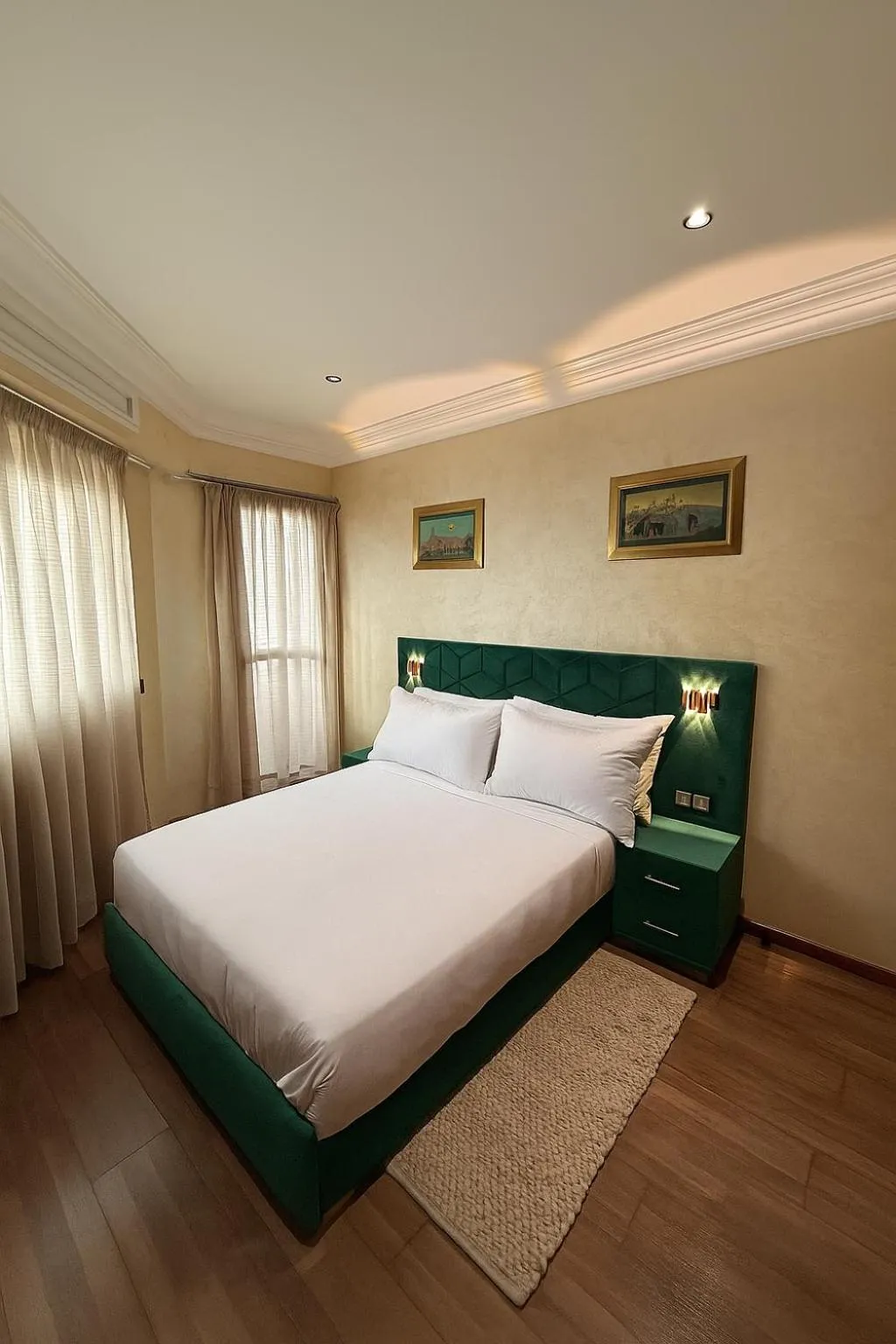 Bed in Appart Hôtel Oleandro