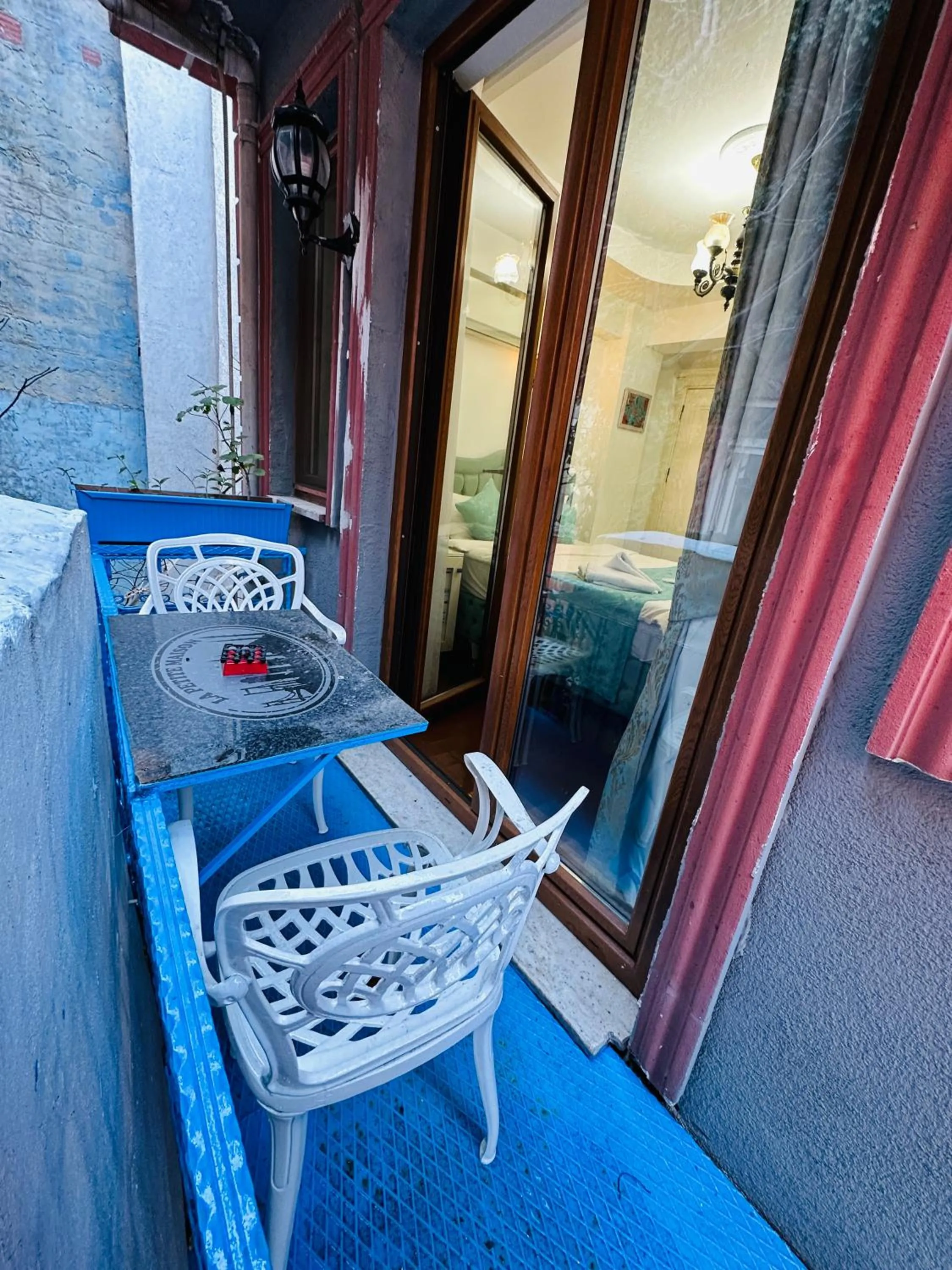 Patio in La Petite Maison Hotel