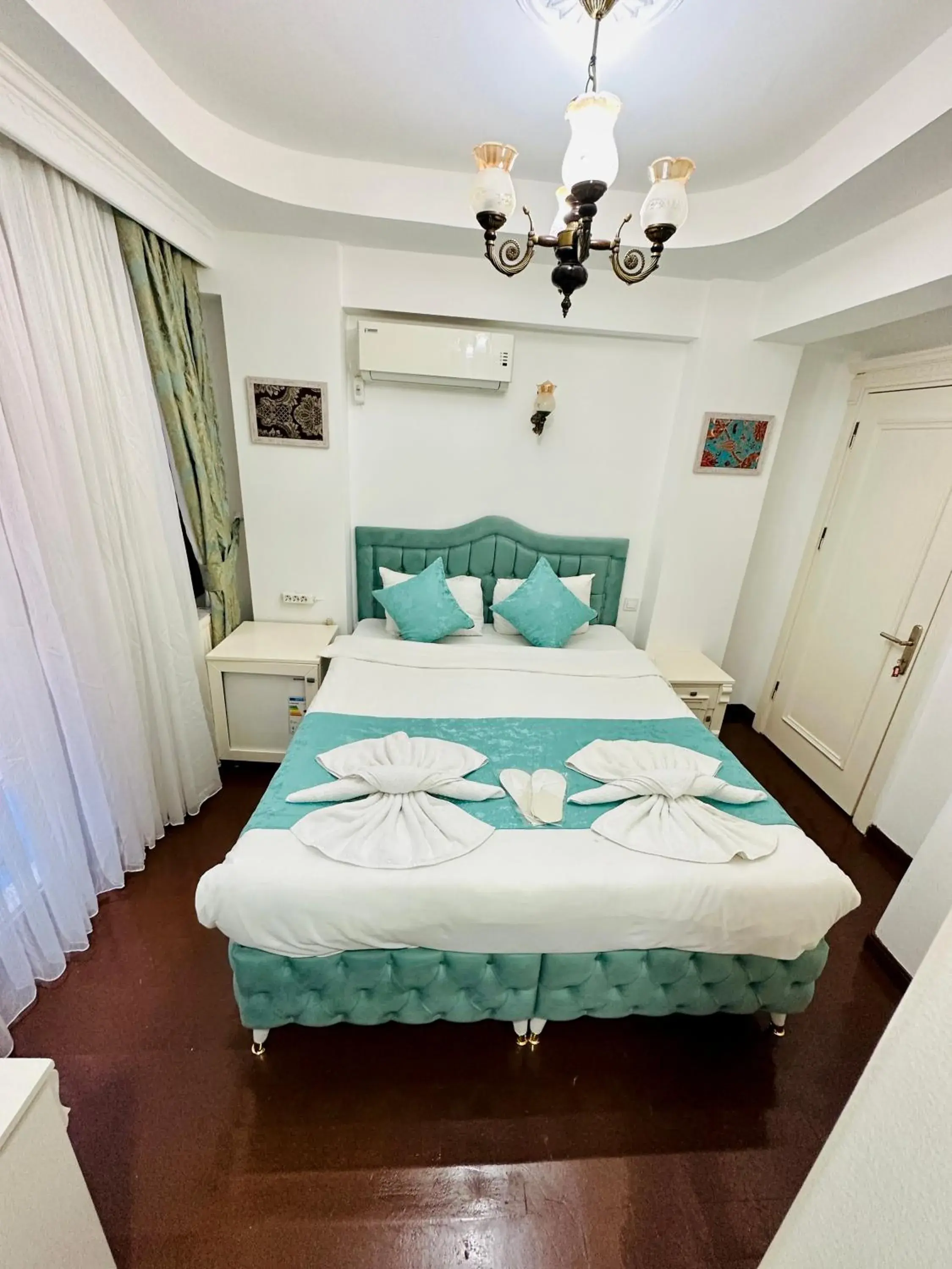 Bed in La Petite Maison Hotel Bed in La Petite Maison Hotel