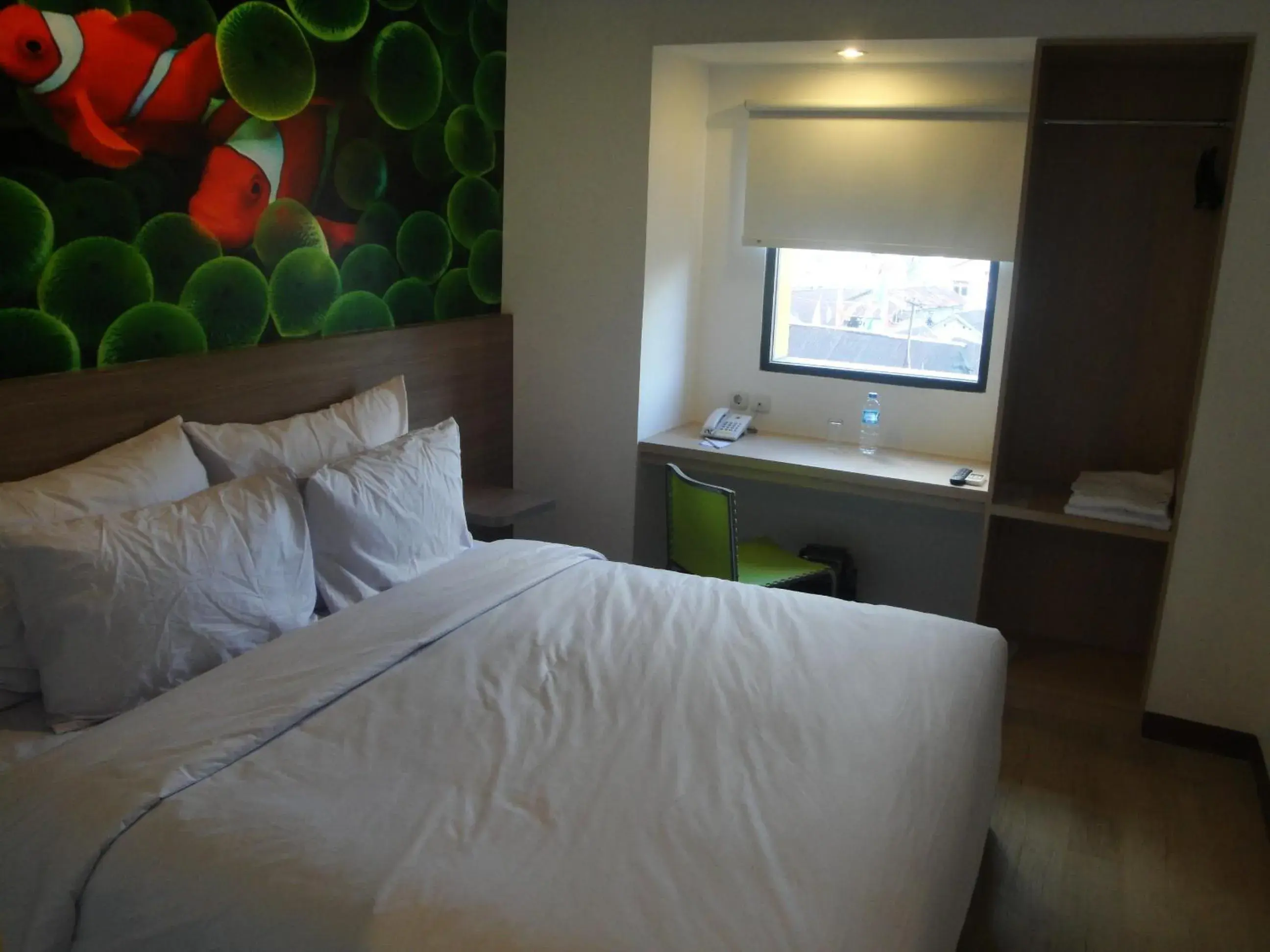 Photo of the whole room, Bed in Top Hotel Manado By Gran Puri