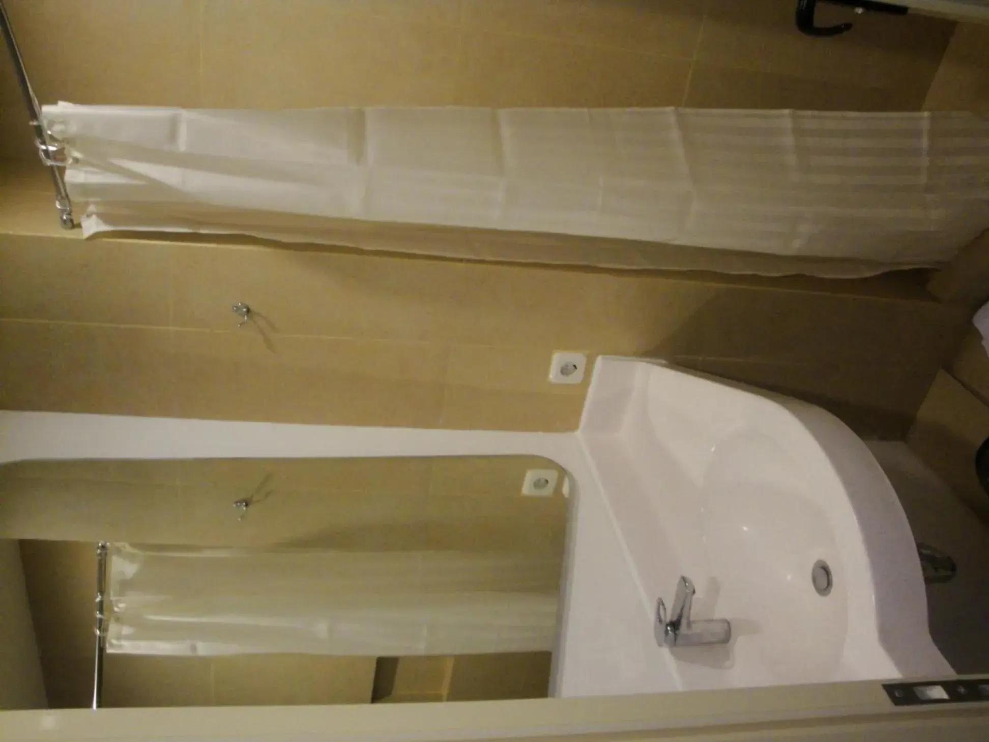 Bathroom in Top Hotel Manado By Gran Puri