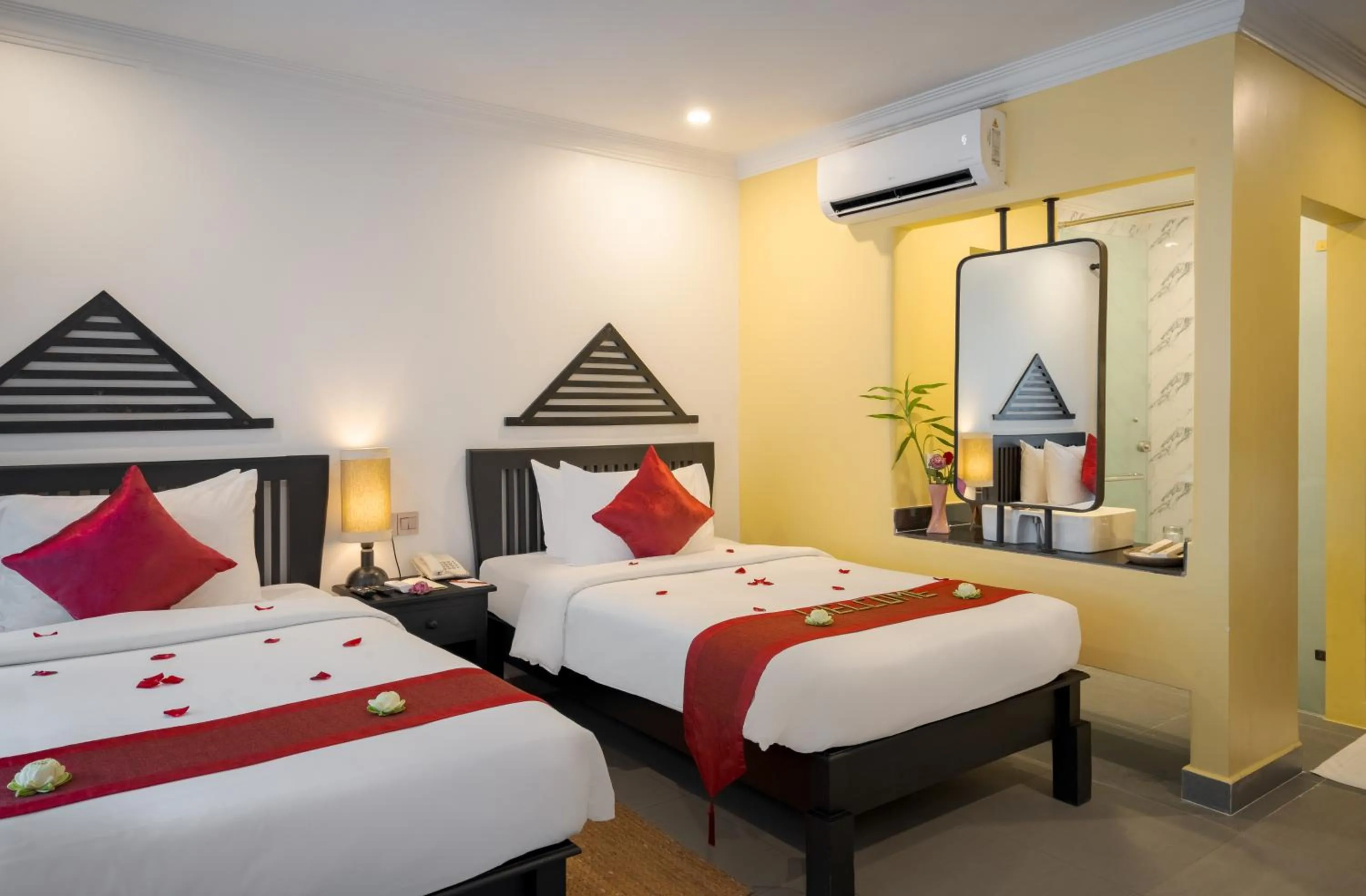 Bed in Khmer Mansion Boutique Hotel