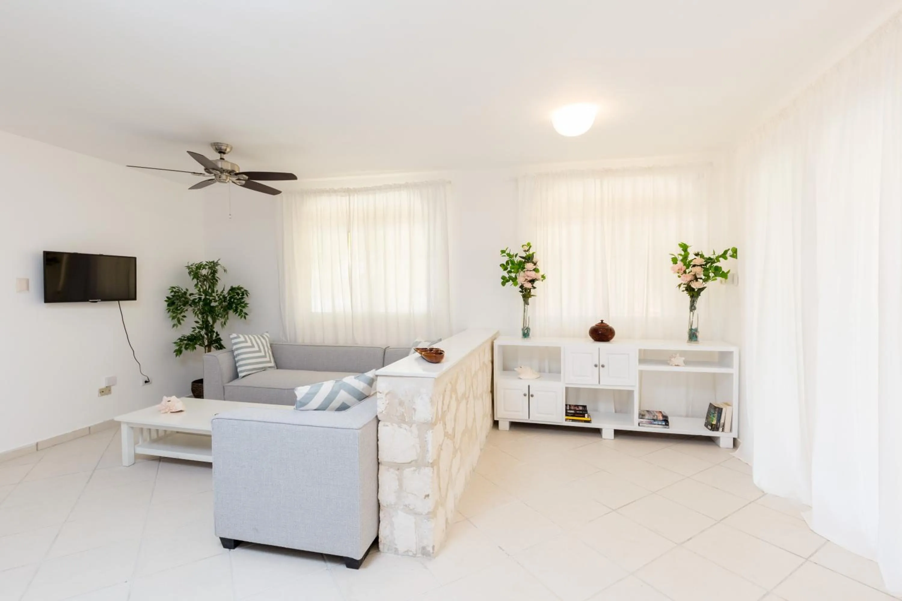 Living room, Bed in Los Corales Beach Village Punta Cana - The original