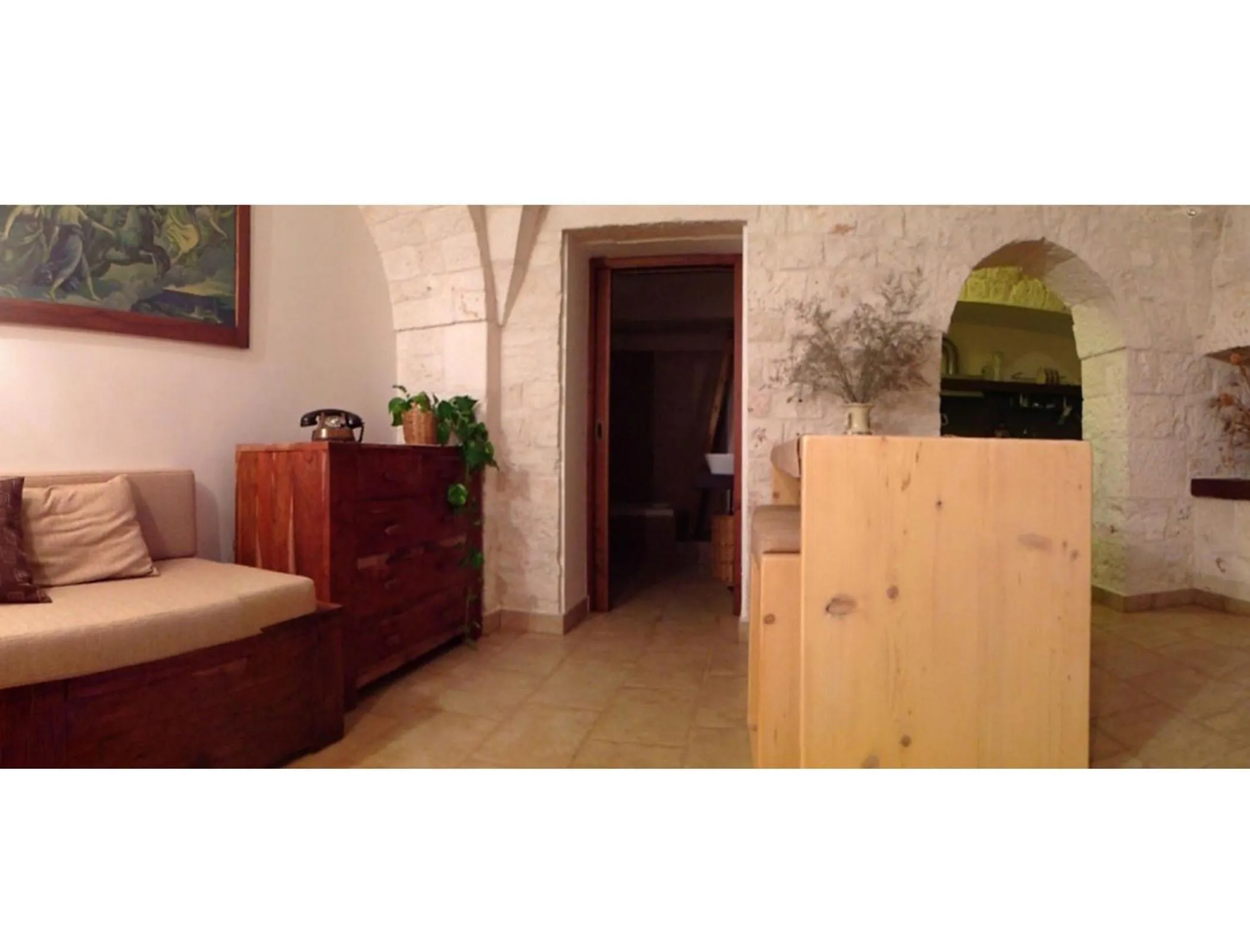 Communal lounge/ TV room in B&B Via dei Trulli