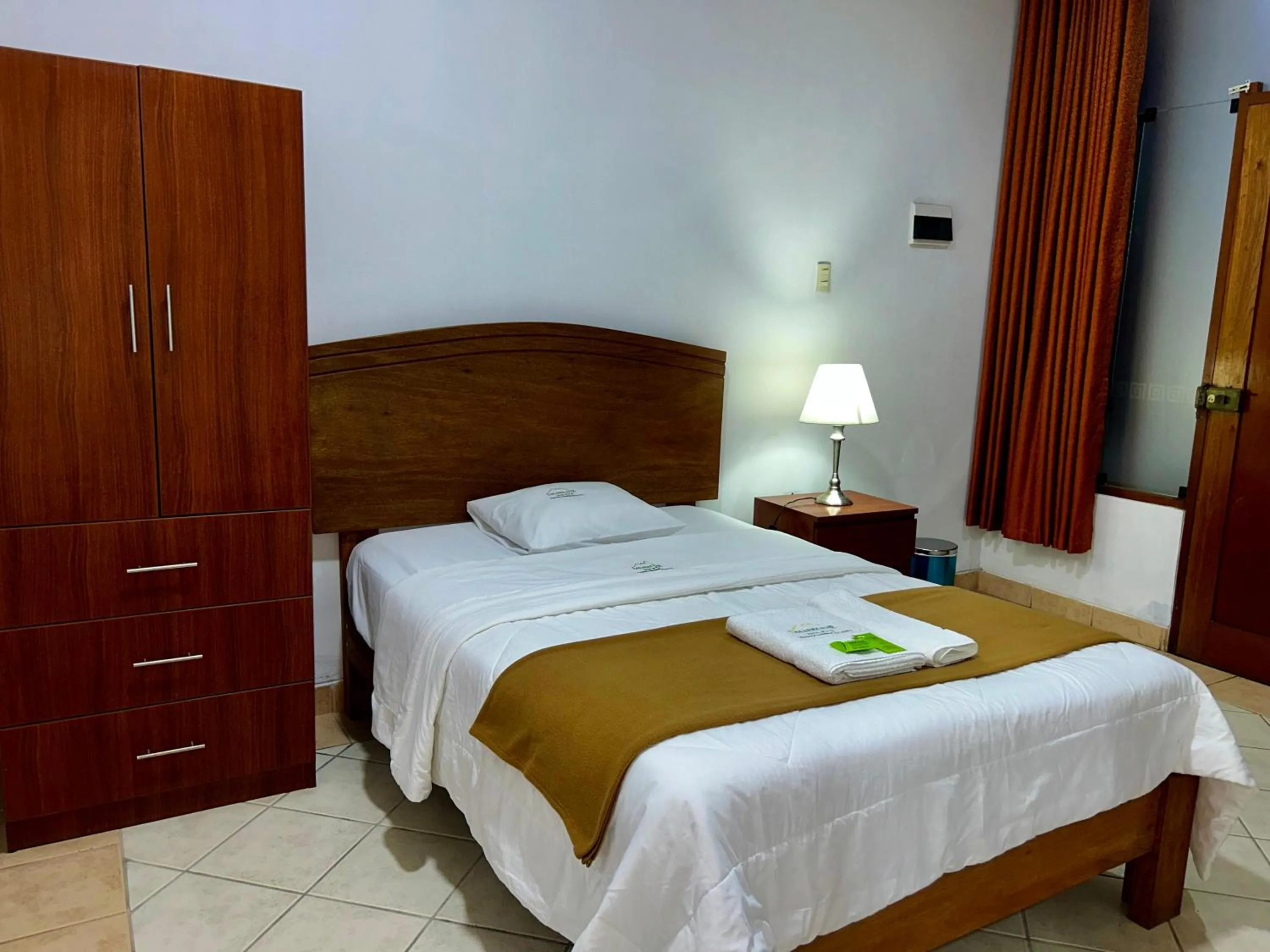 Bed in HOTEL LOS ANDES SUITE