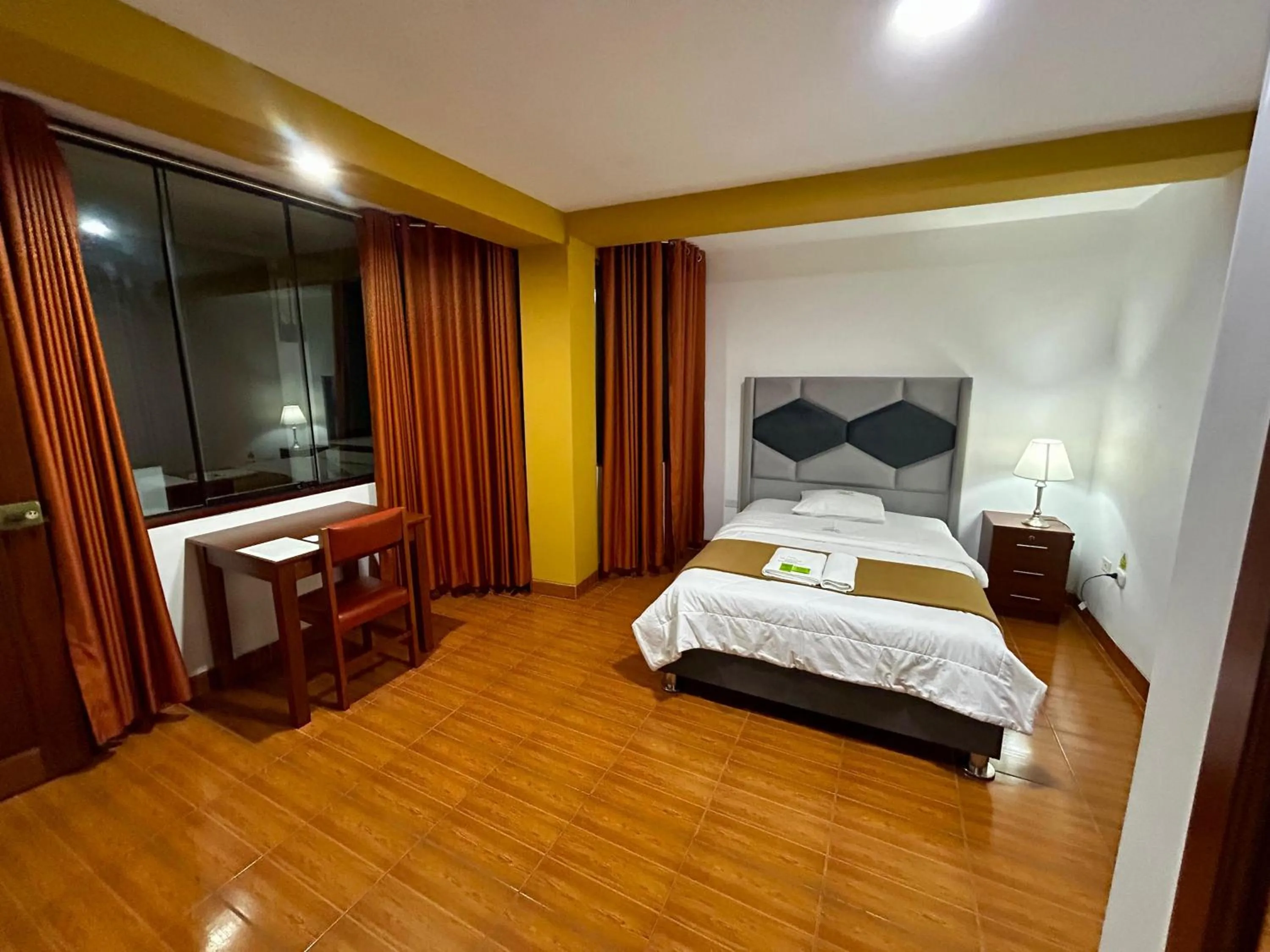 Bed in HOTEL LOS ANDES SUITE