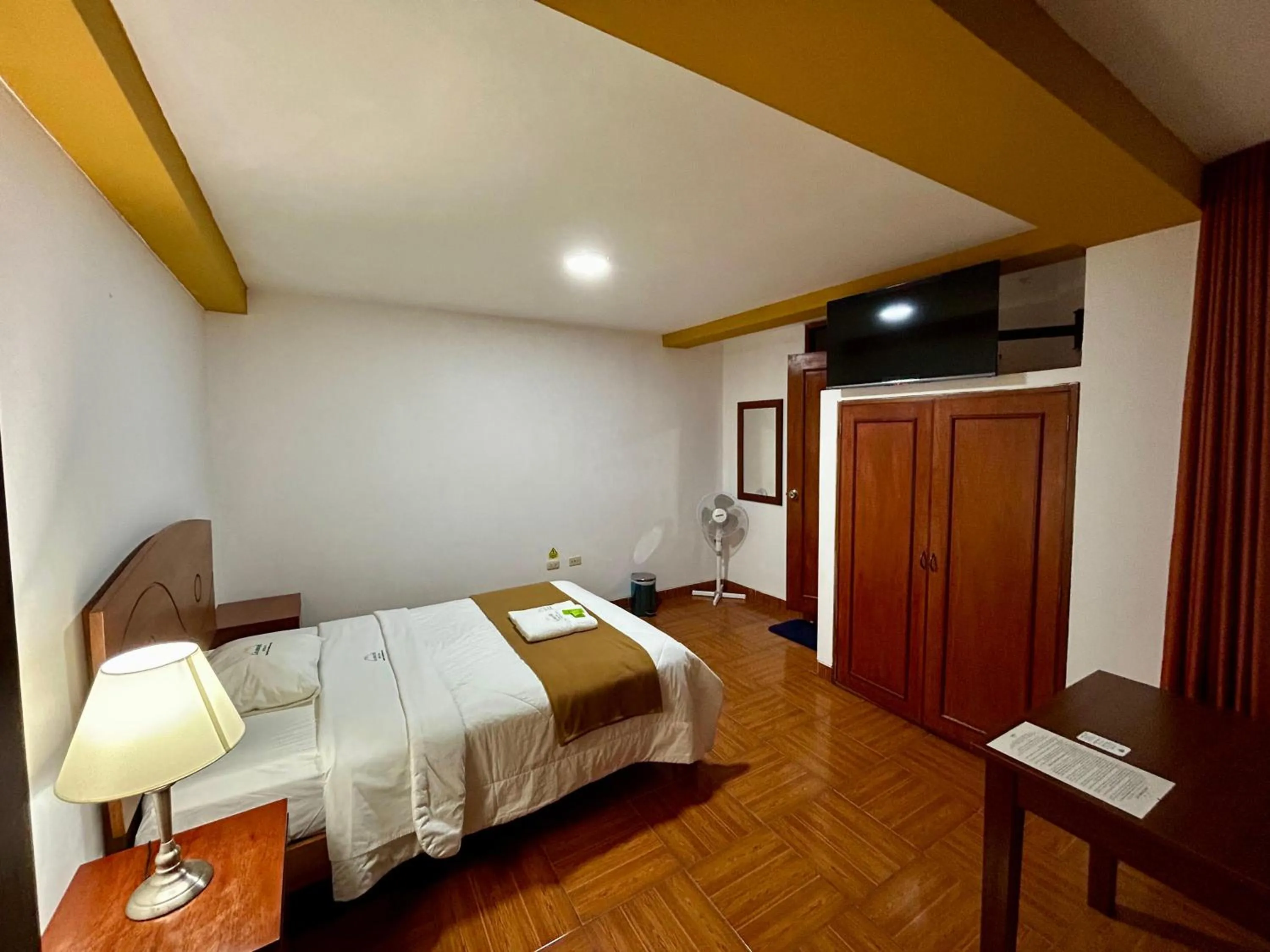 Bed in HOTEL LOS ANDES SUITE