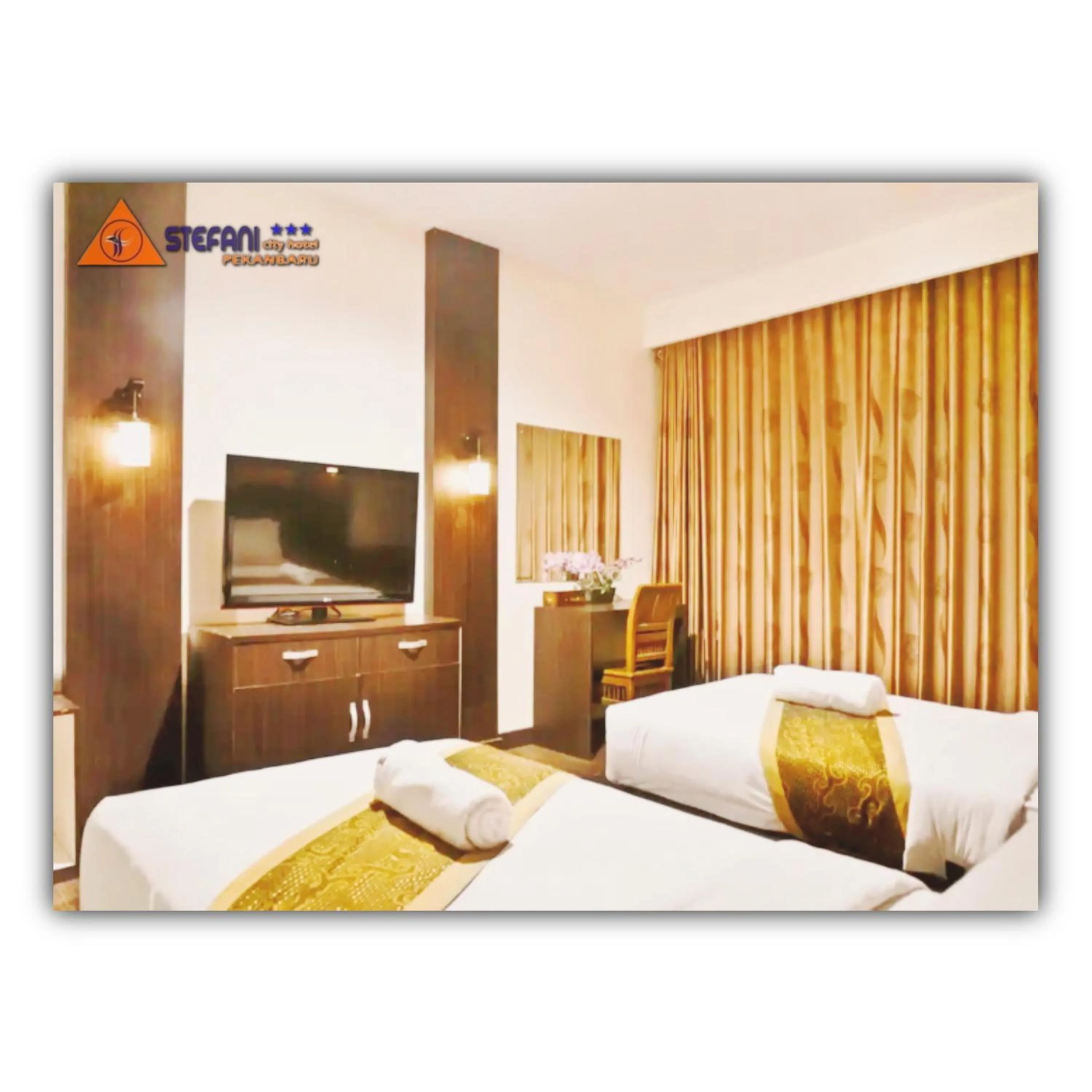 Bed in STEFANI MAKATI HOTEL