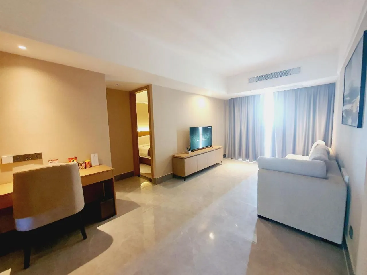 Living room, Bed in JD POLMAN Hotel