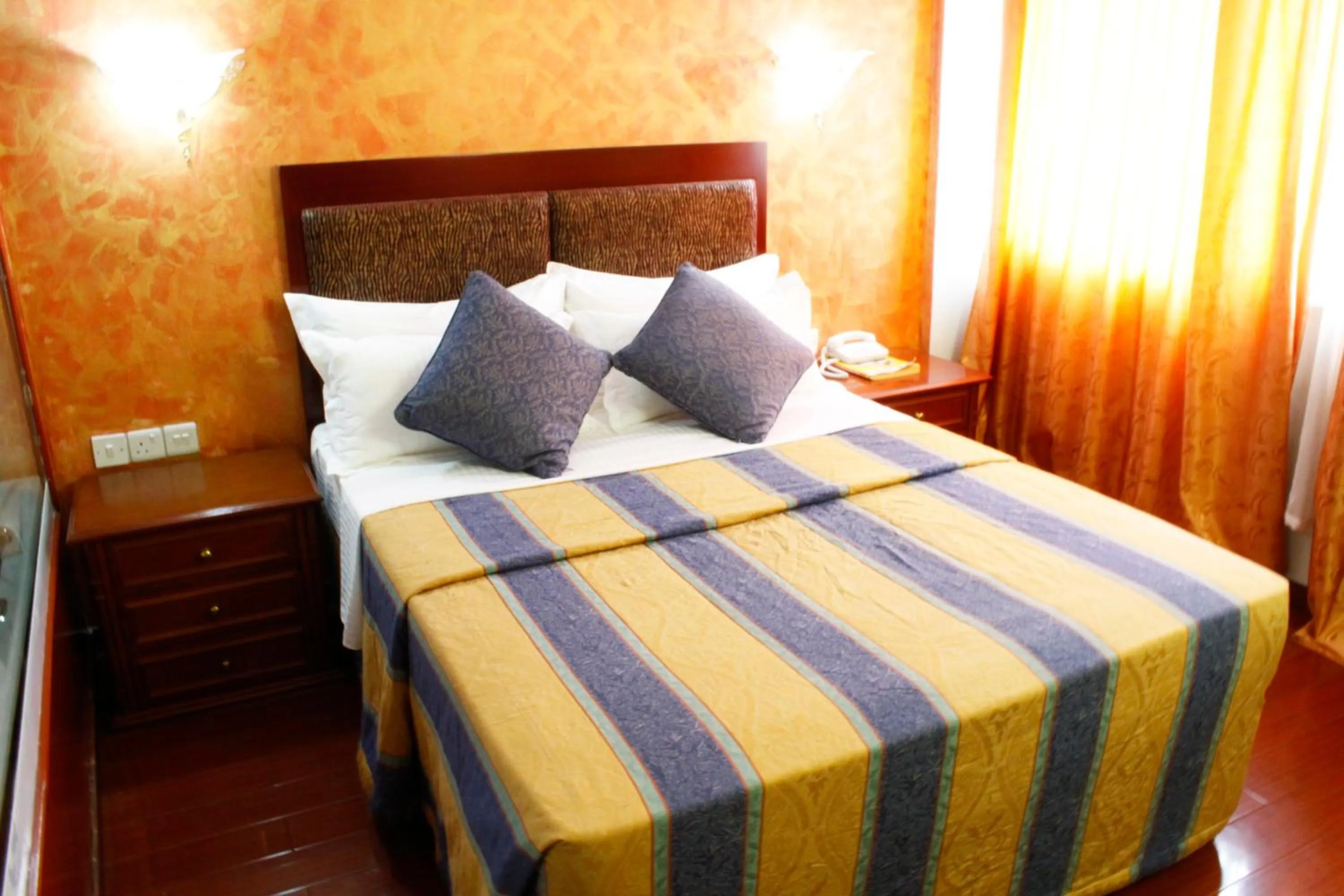 Bed in New Mwanza Hotel