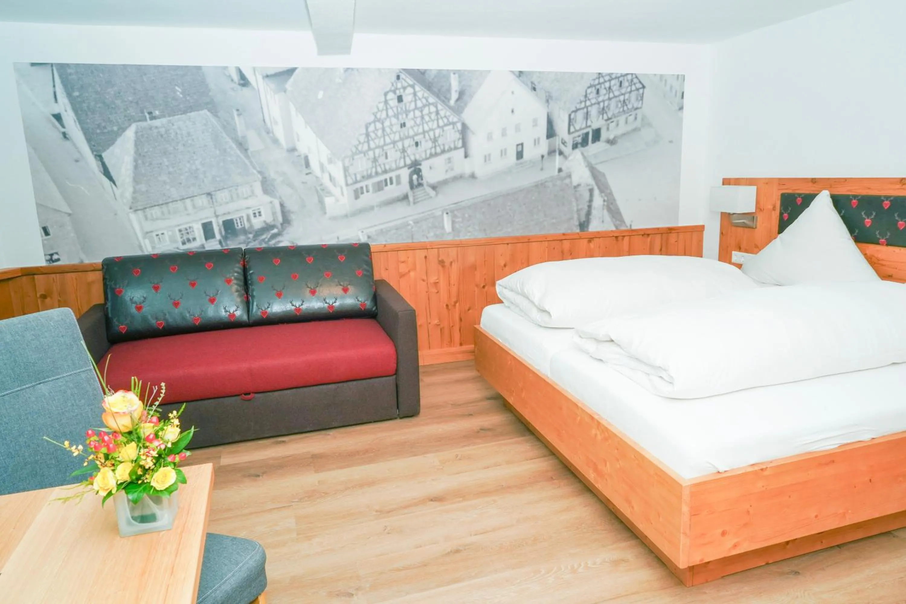 Seating area, Bed in Gasthof Zur Seku