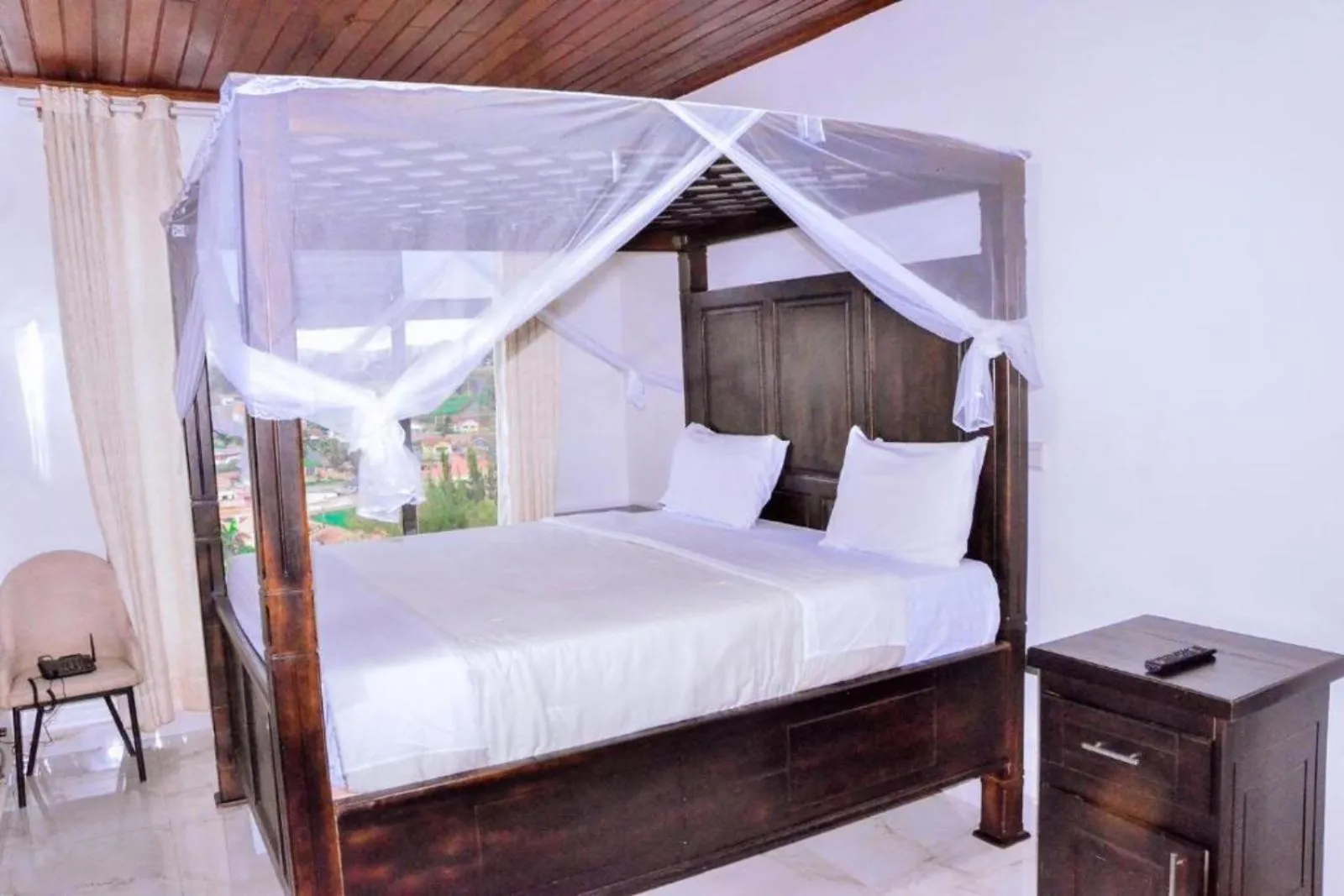 Bed in The Keza Hotel and Apartments