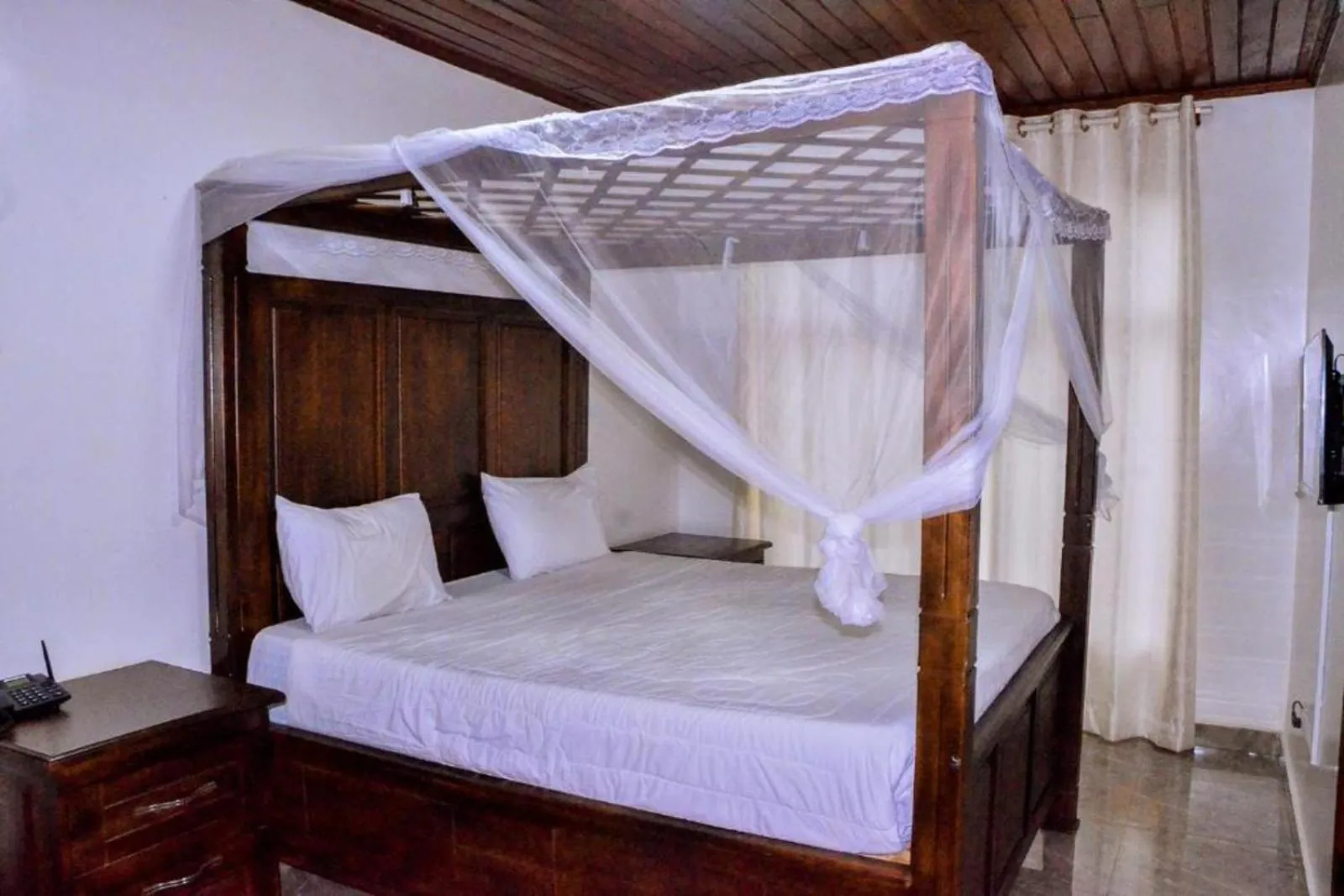 Bed in The Keza Hotel and Apartments