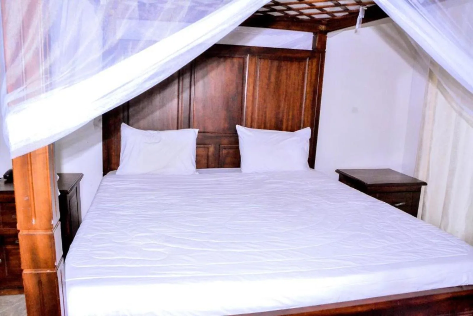 Bed in The Keza Hotel and Apartments