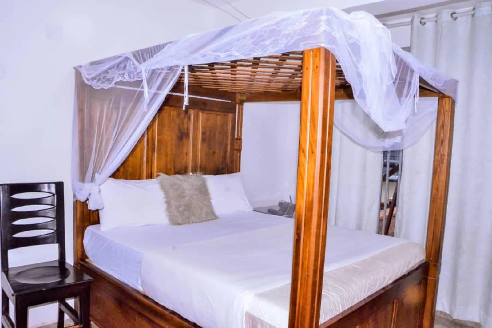 Bed in The Keza Hotel and Apartments