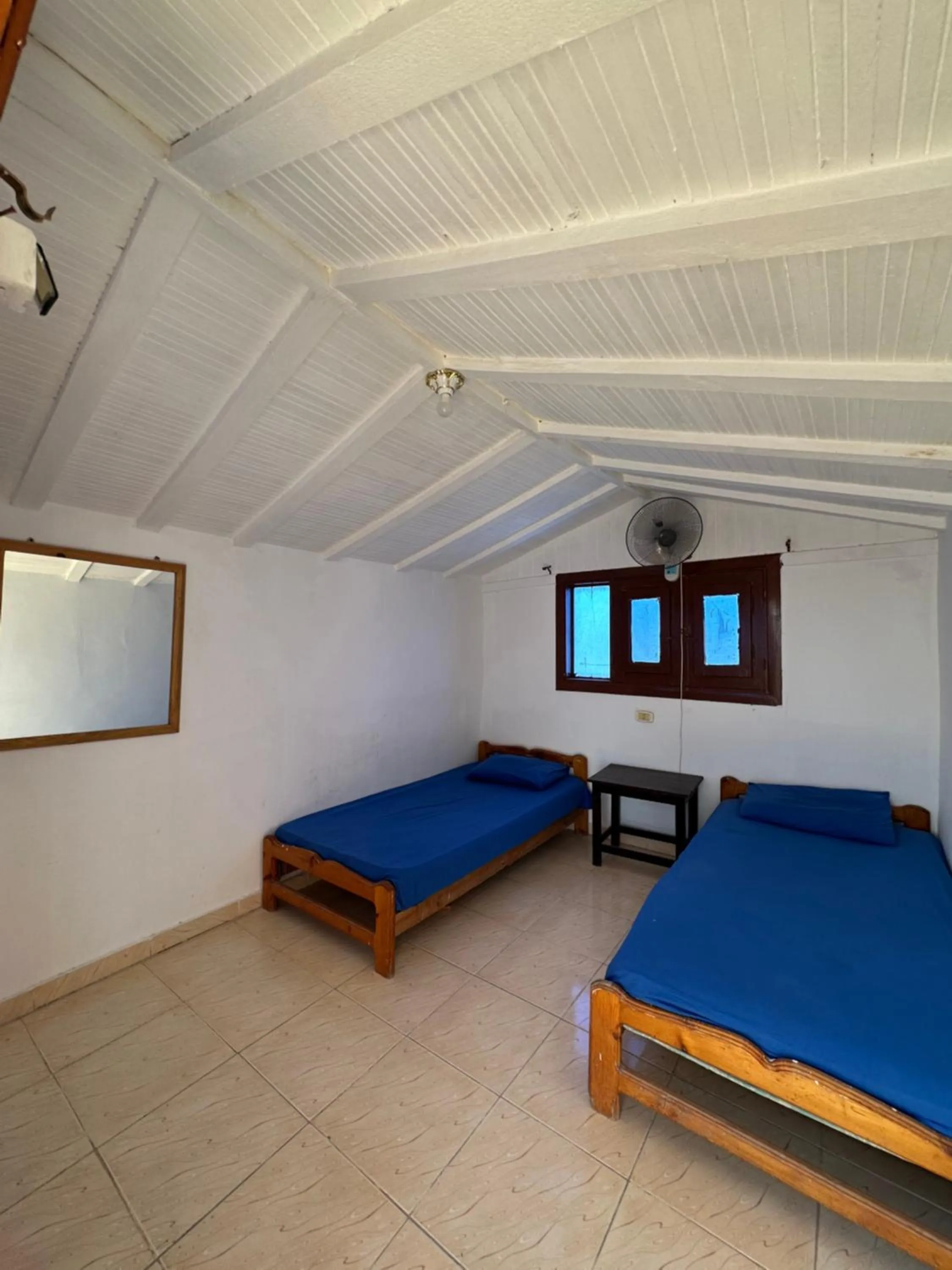 Photo of the whole room, Bed in Seven Heaven Hotel And Diving Center