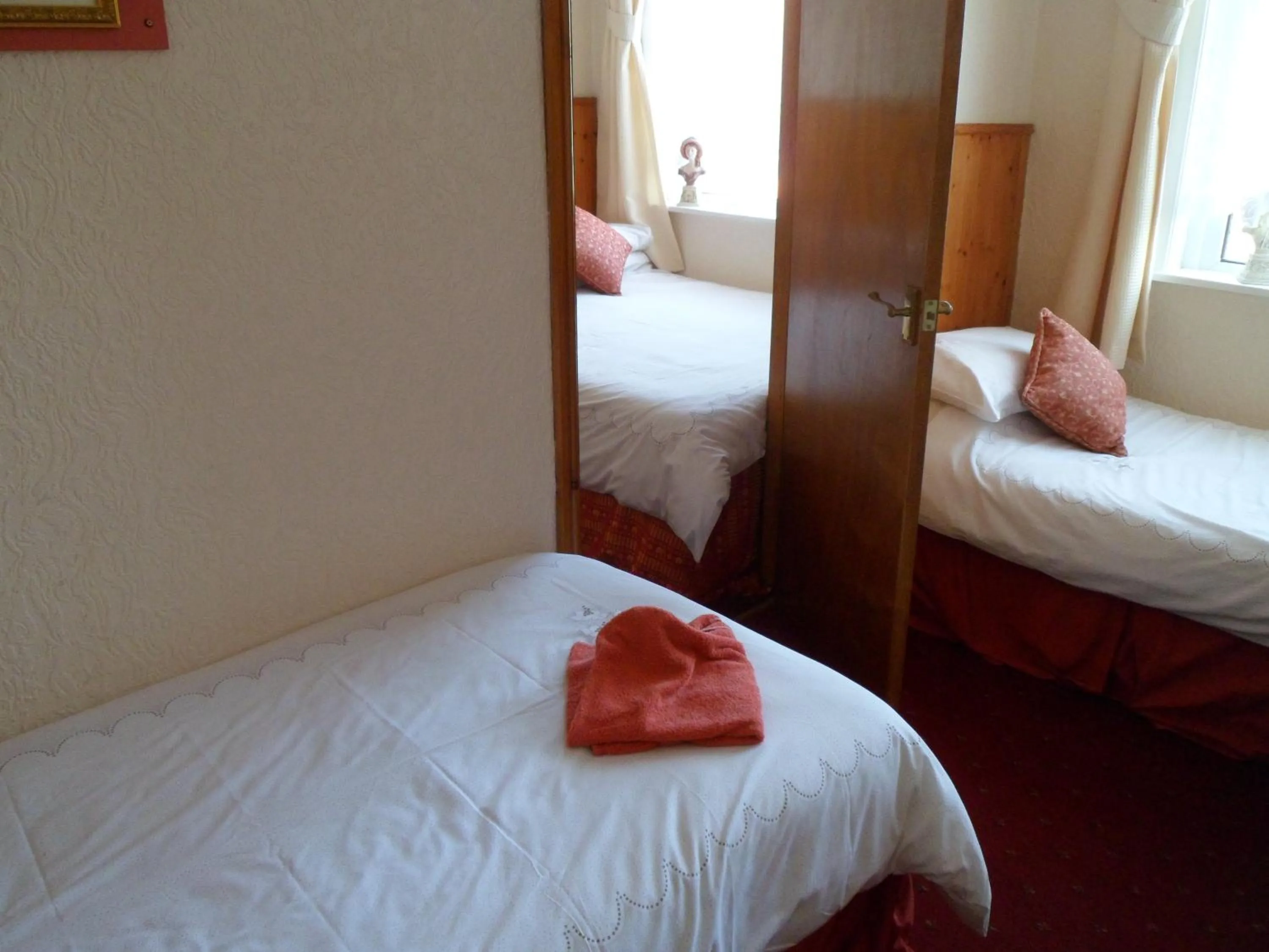 Bedroom in Camelot Hotel - Couples Only