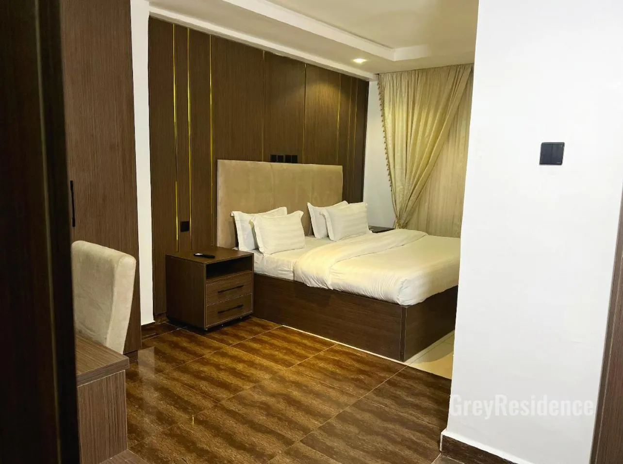 Bed in Grey Residence