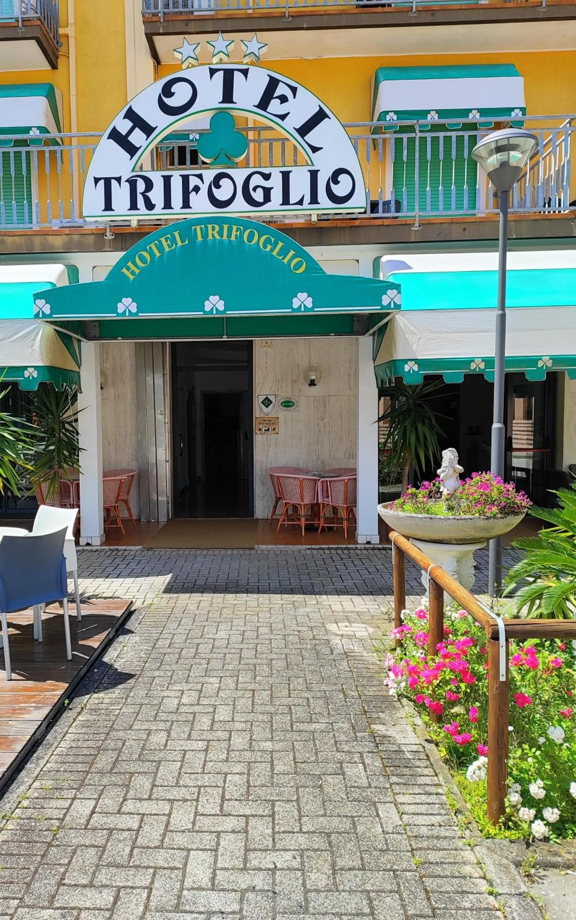 Property logo or sign in Hotel Trifoglio